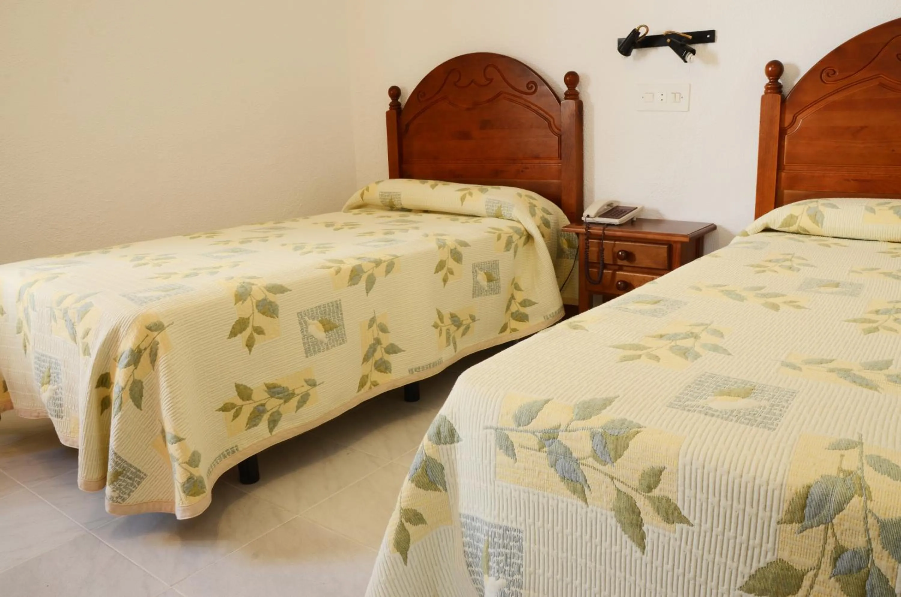 Bed in Hotel El Coloso