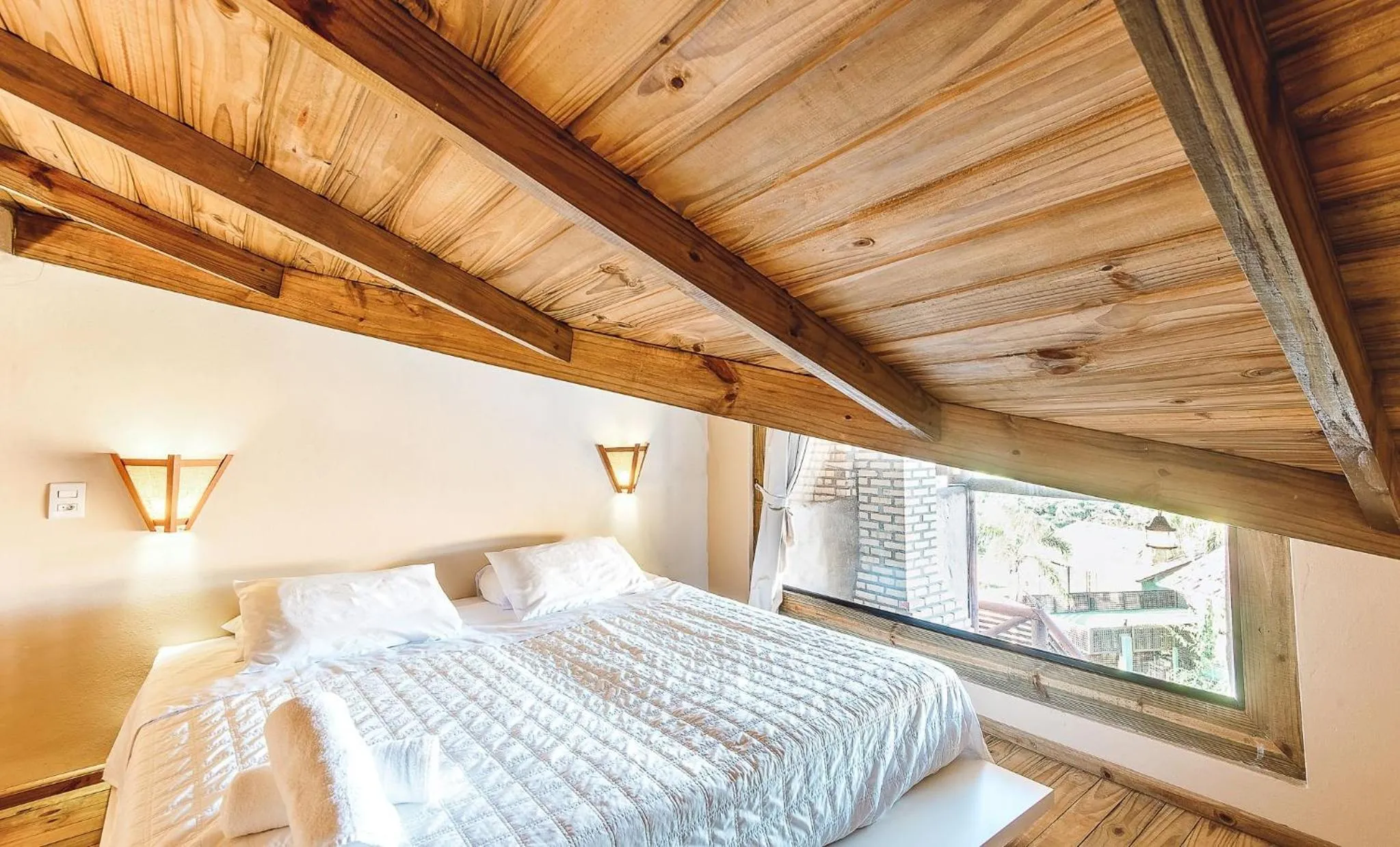 Bed in Pousada Bangalôs do Rosa