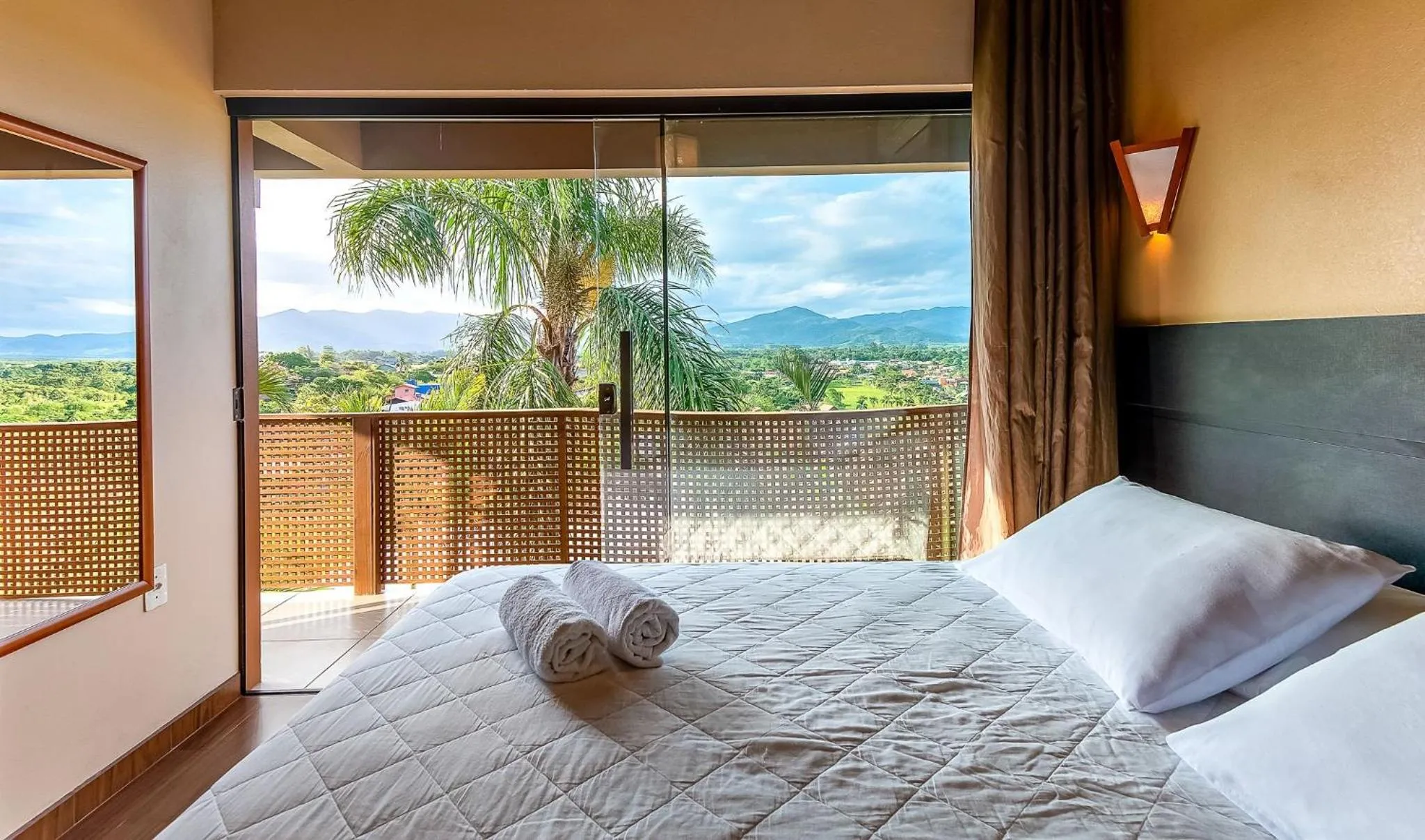 Balcony/Terrace, Bed in Pousada Bangalôs do Rosa