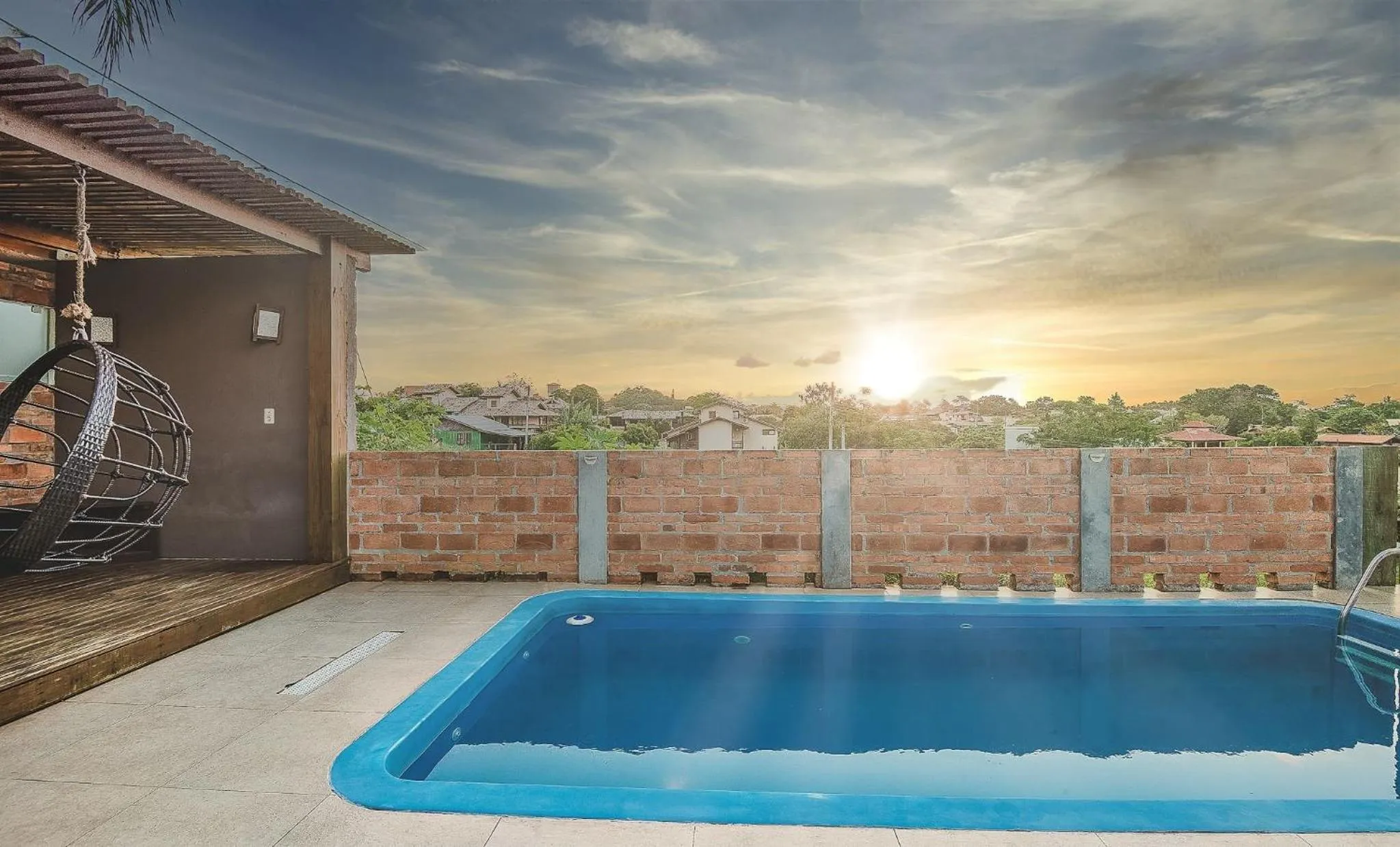 Swimming pool in Pousada Bangalôs do Rosa