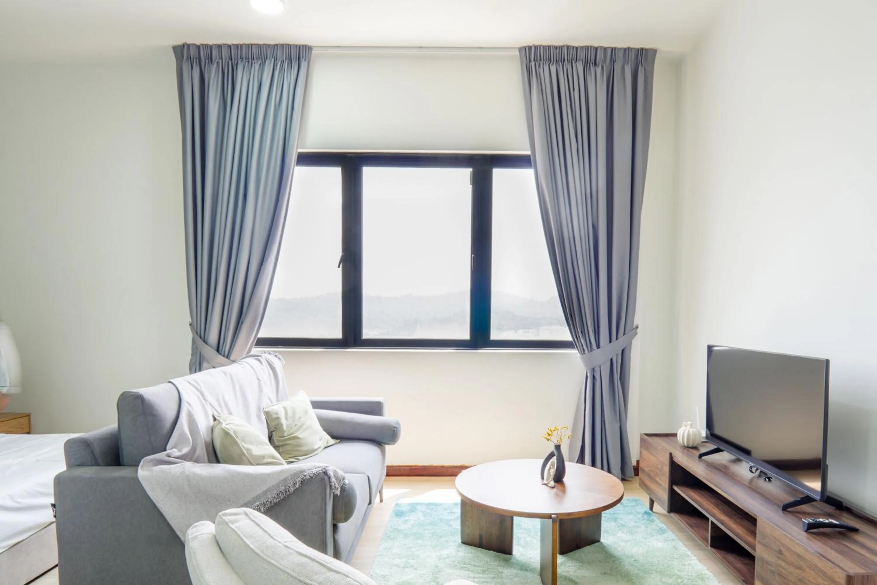 Living room in Encorp Strand Residences by Airhost