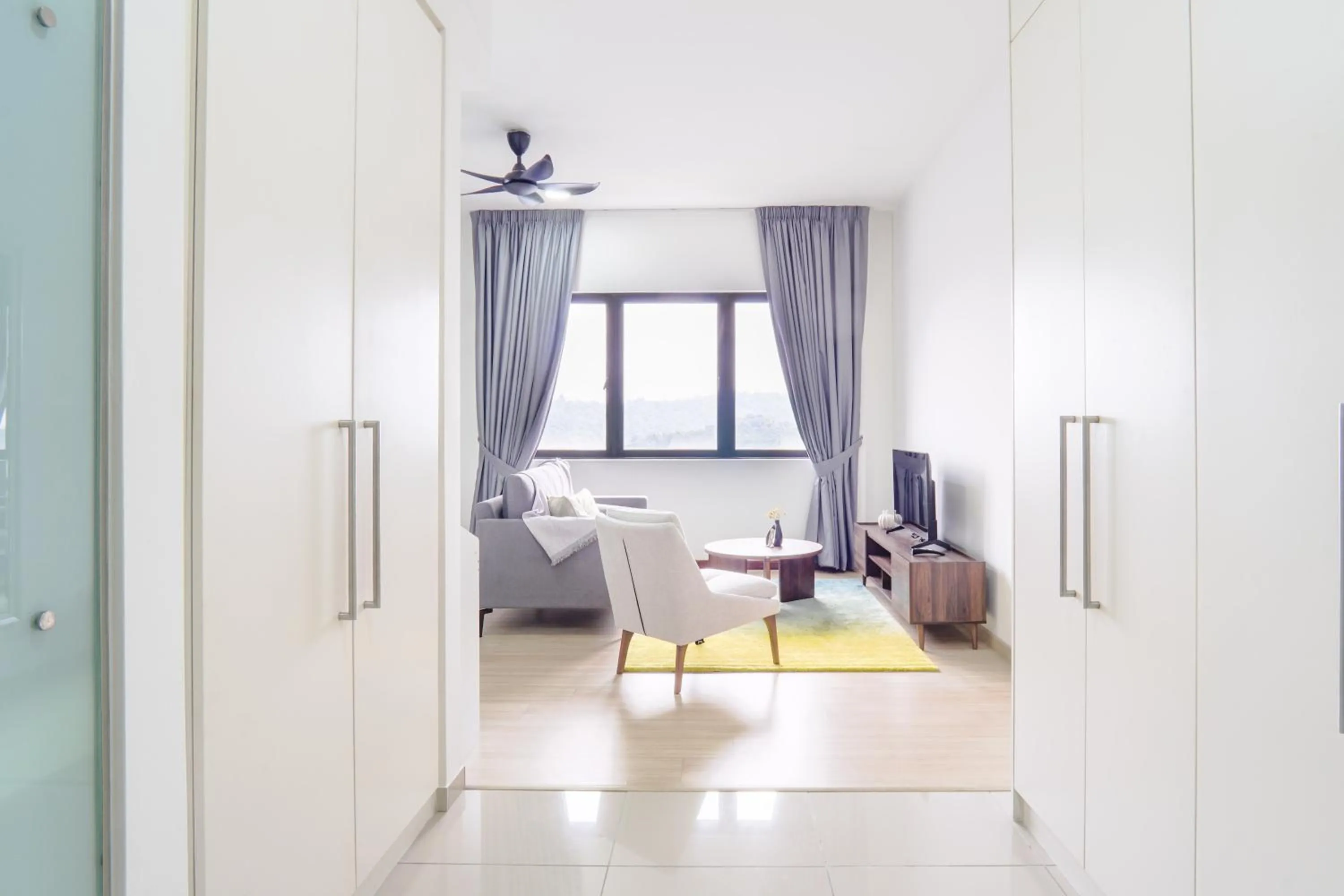 Living room in Encorp Strand Residences by Airhost