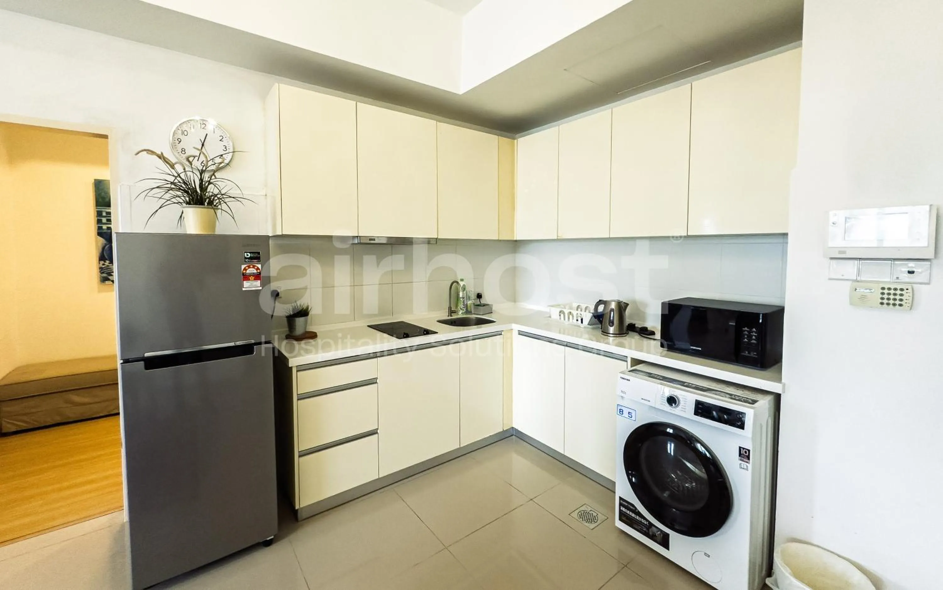 Kitchen or kitchenette in Encorp Strand Residences by Airhost