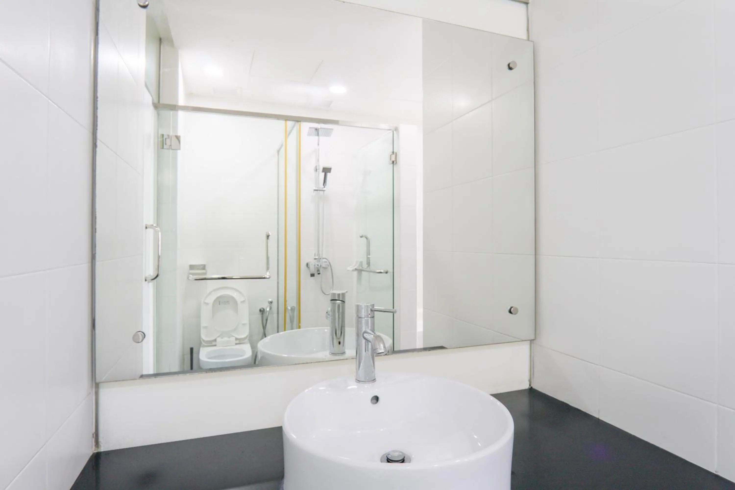 Shower in Encorp Strand Residences by Airhost