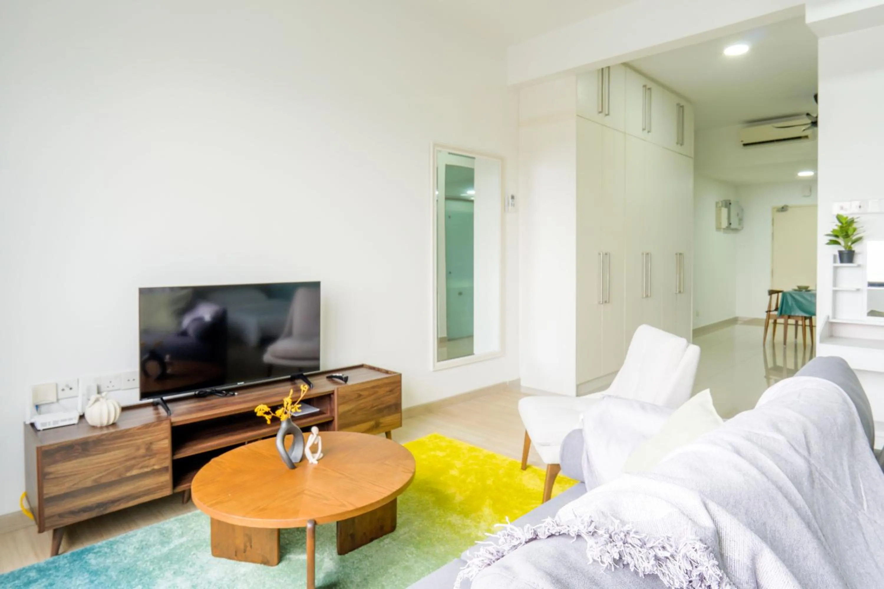 Living room in Encorp Strand Residences by Airhost