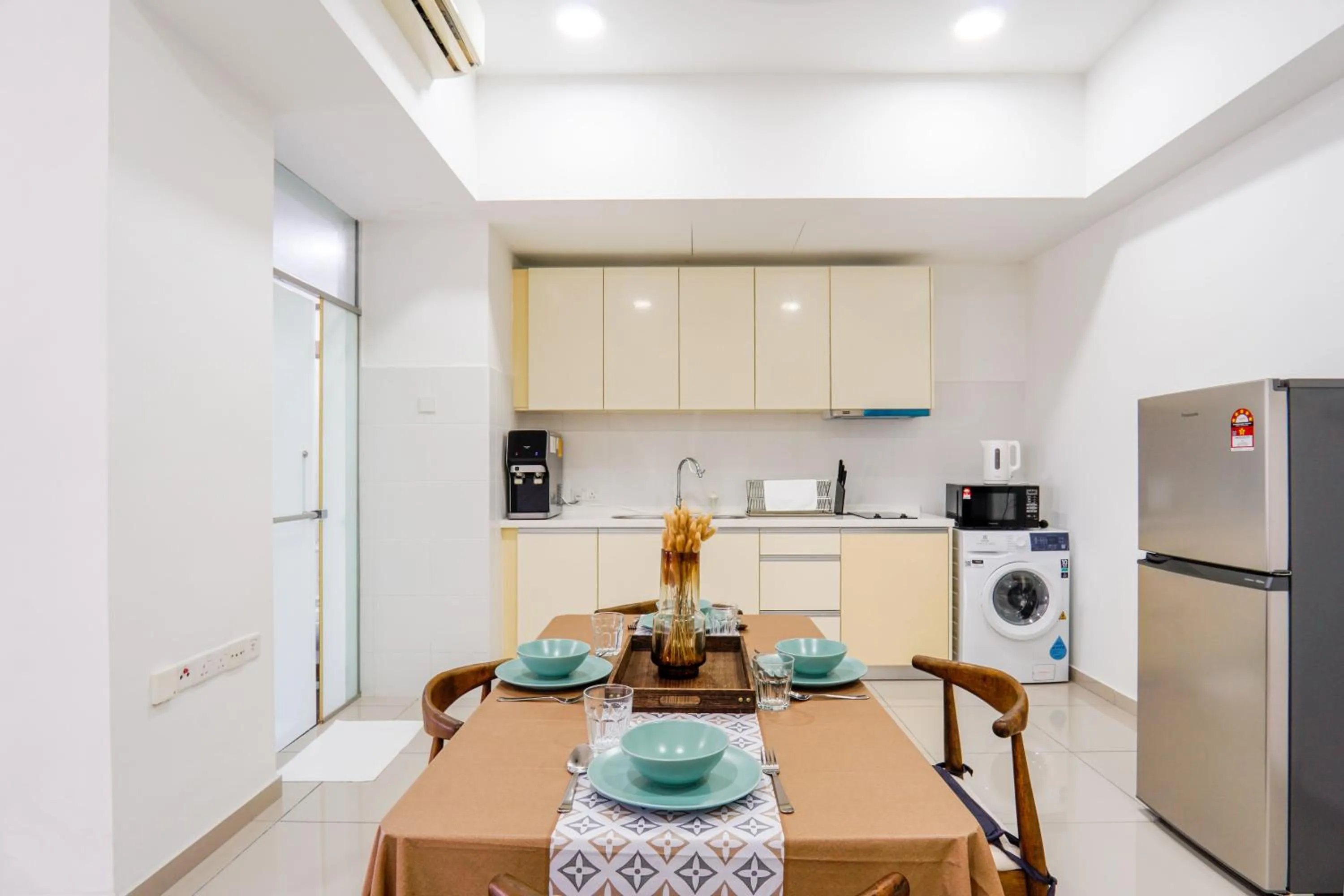 Kitchen or kitchenette in Encorp Strand Residences by Airhost