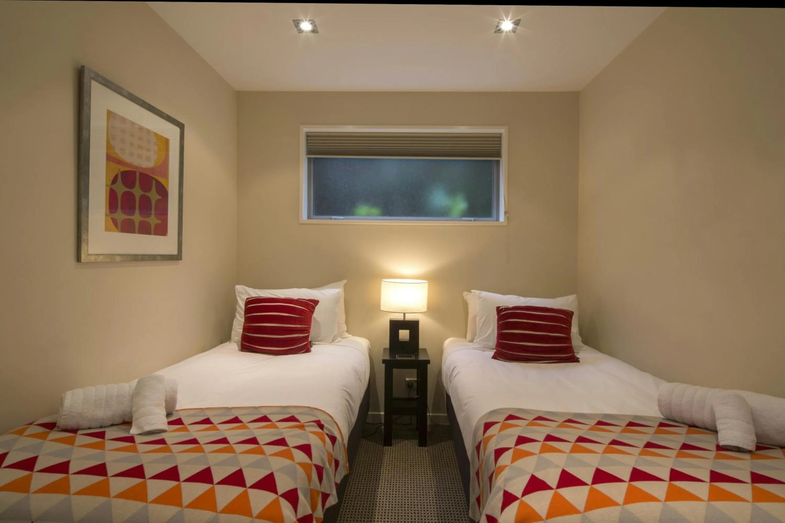 Bed in LakeRidge Queenstown by Staysouth