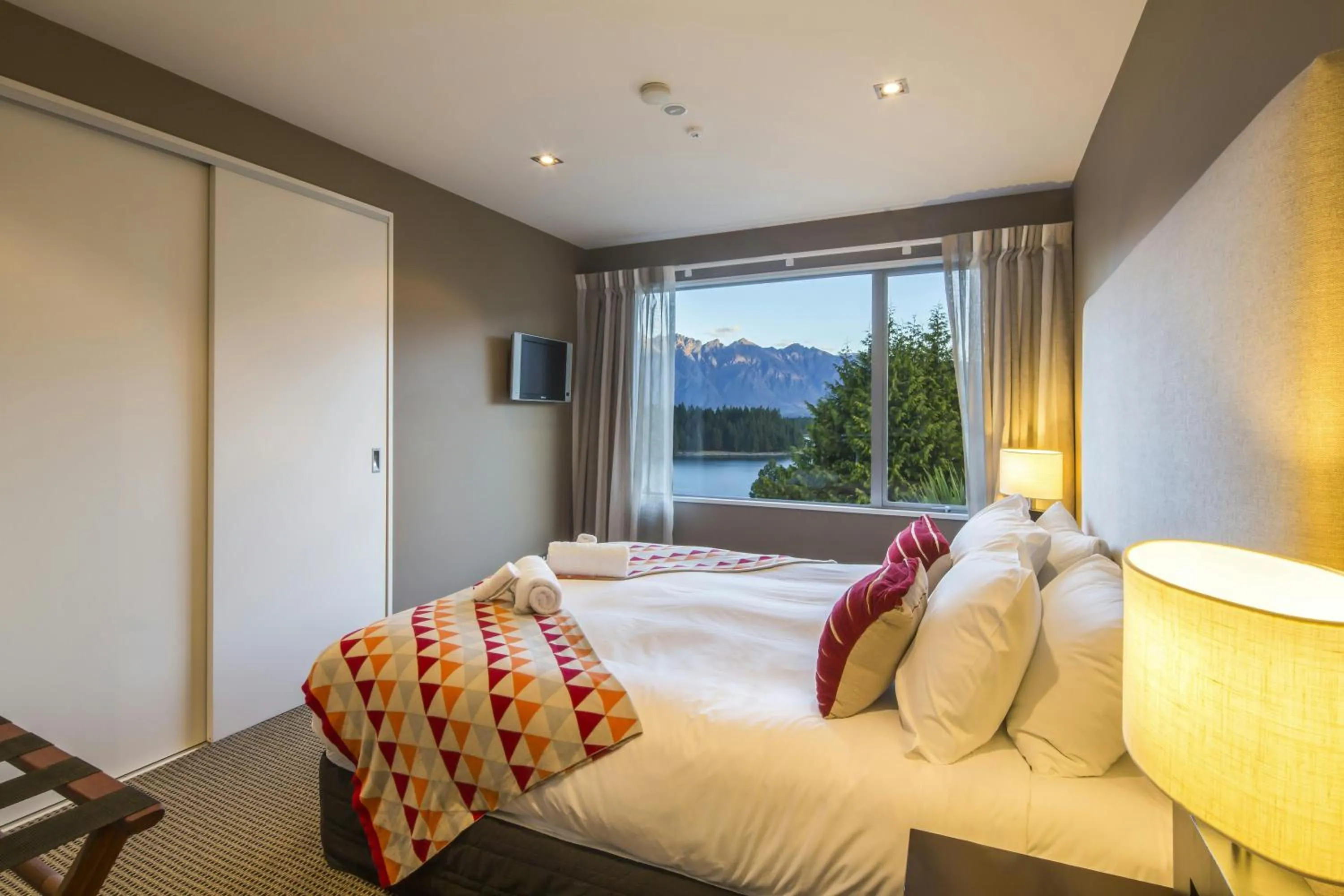 Bed in LakeRidge Queenstown by Staysouth