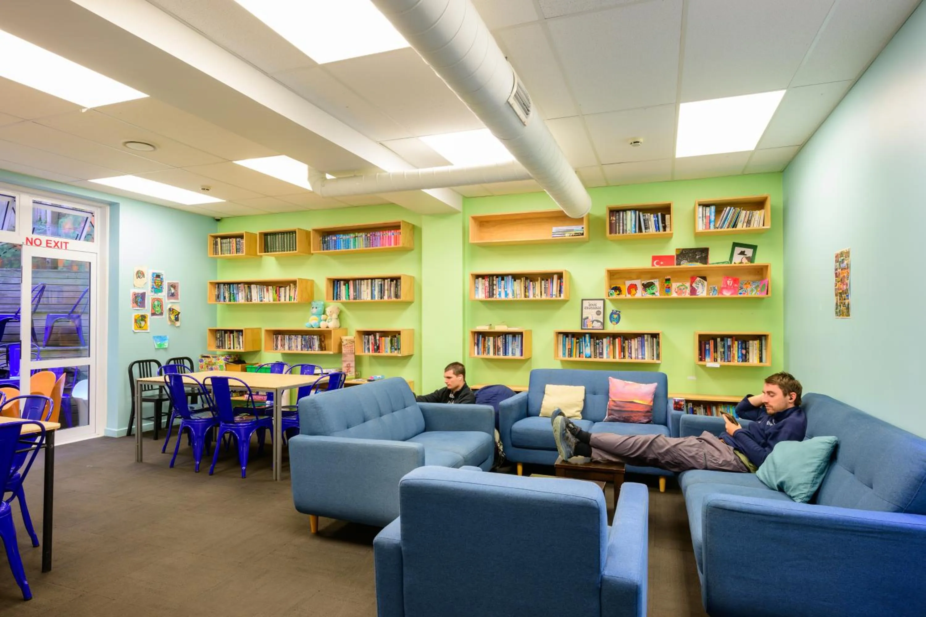 Communal lounge/ TV room in Trek Global Backpackers