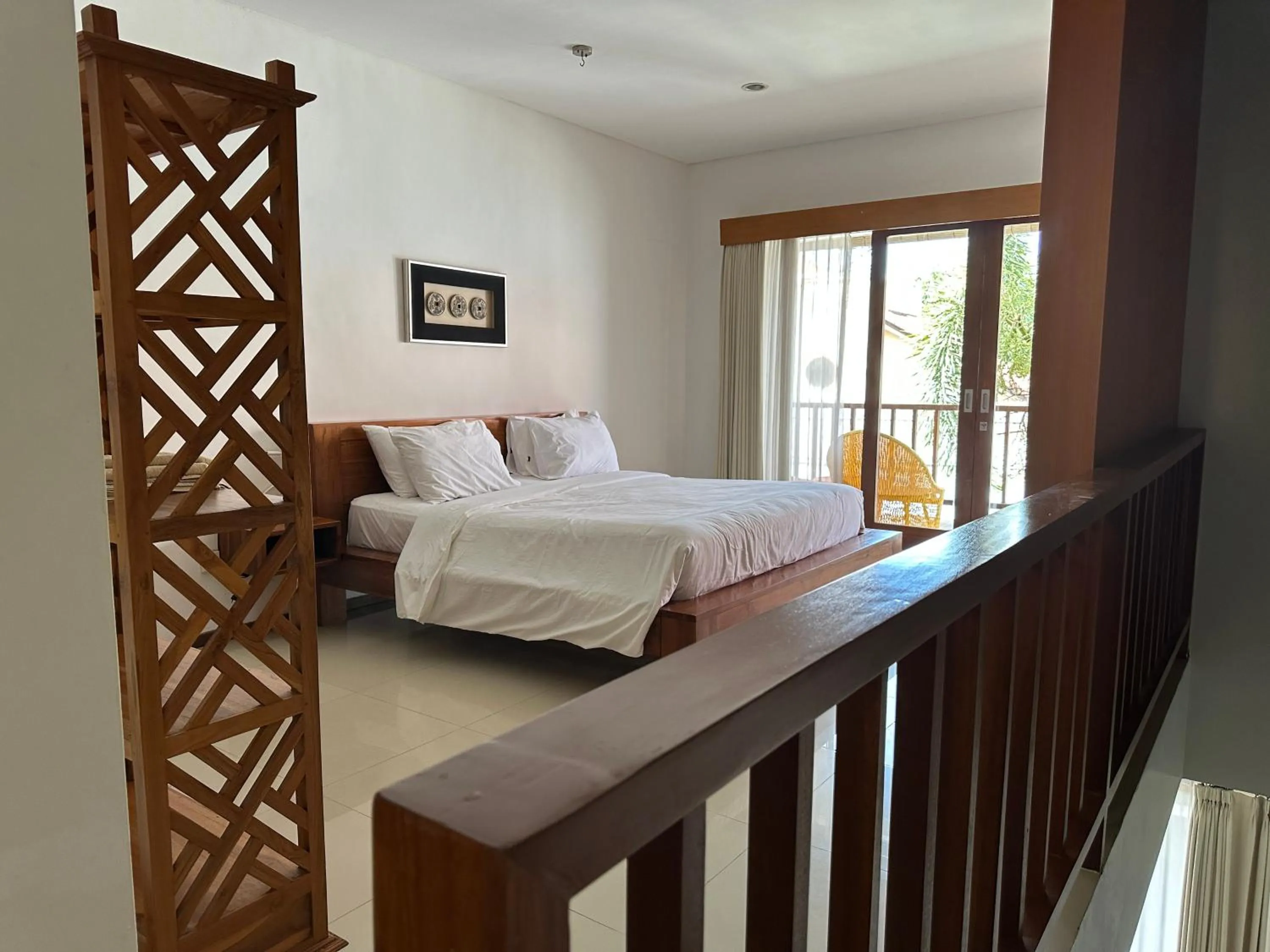 Bed in Balcony Living Apartment