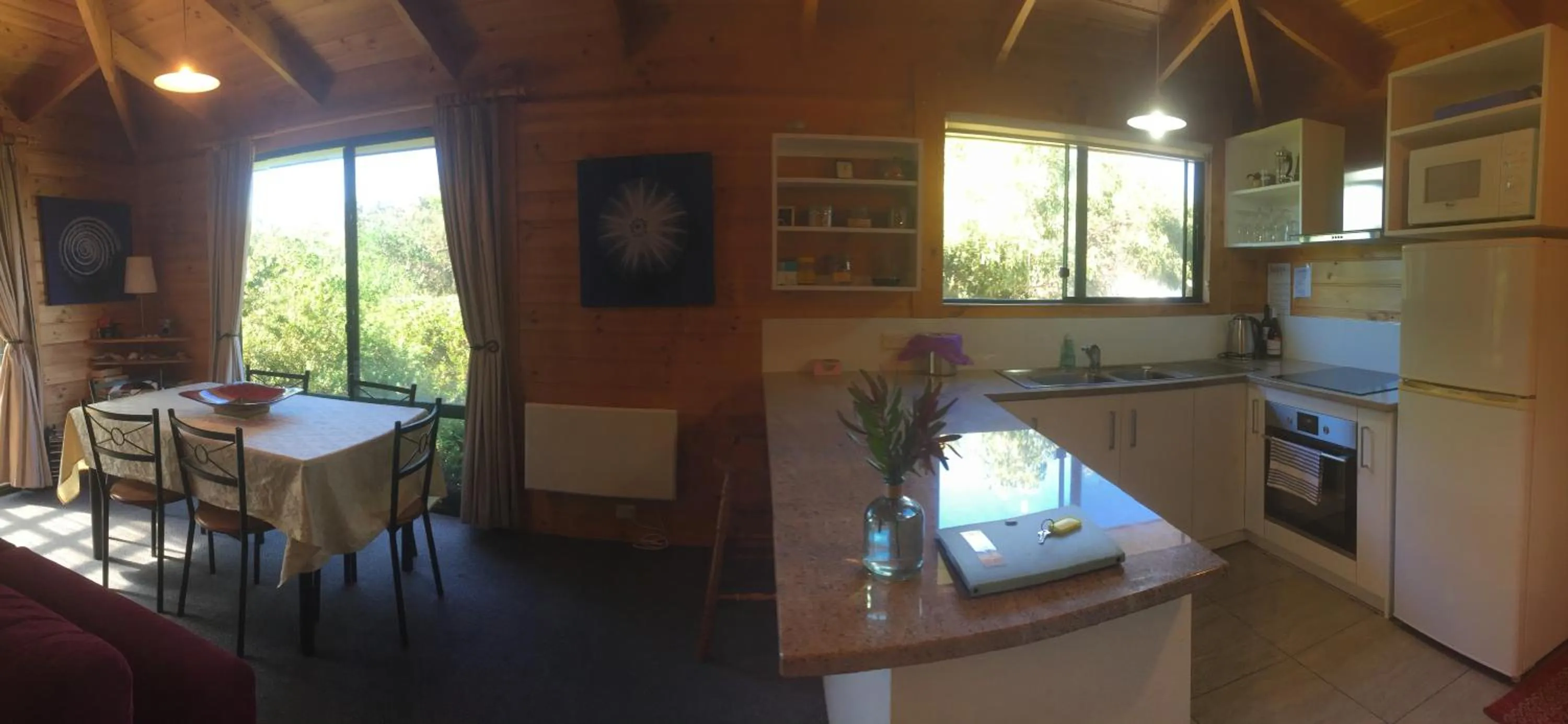 Kitchen or kitchenette in Sandpiper Ocean Cottages