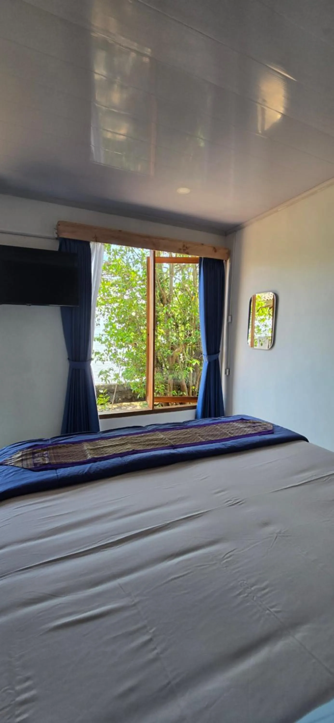 Bed in Omah Alchy Cottages