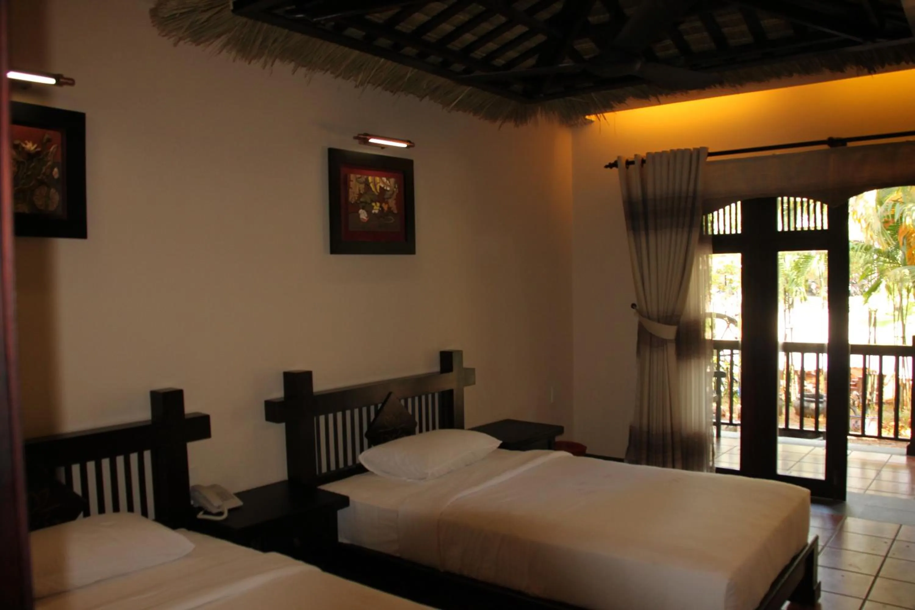 Bedroom, Bed in Lotus Village Resort