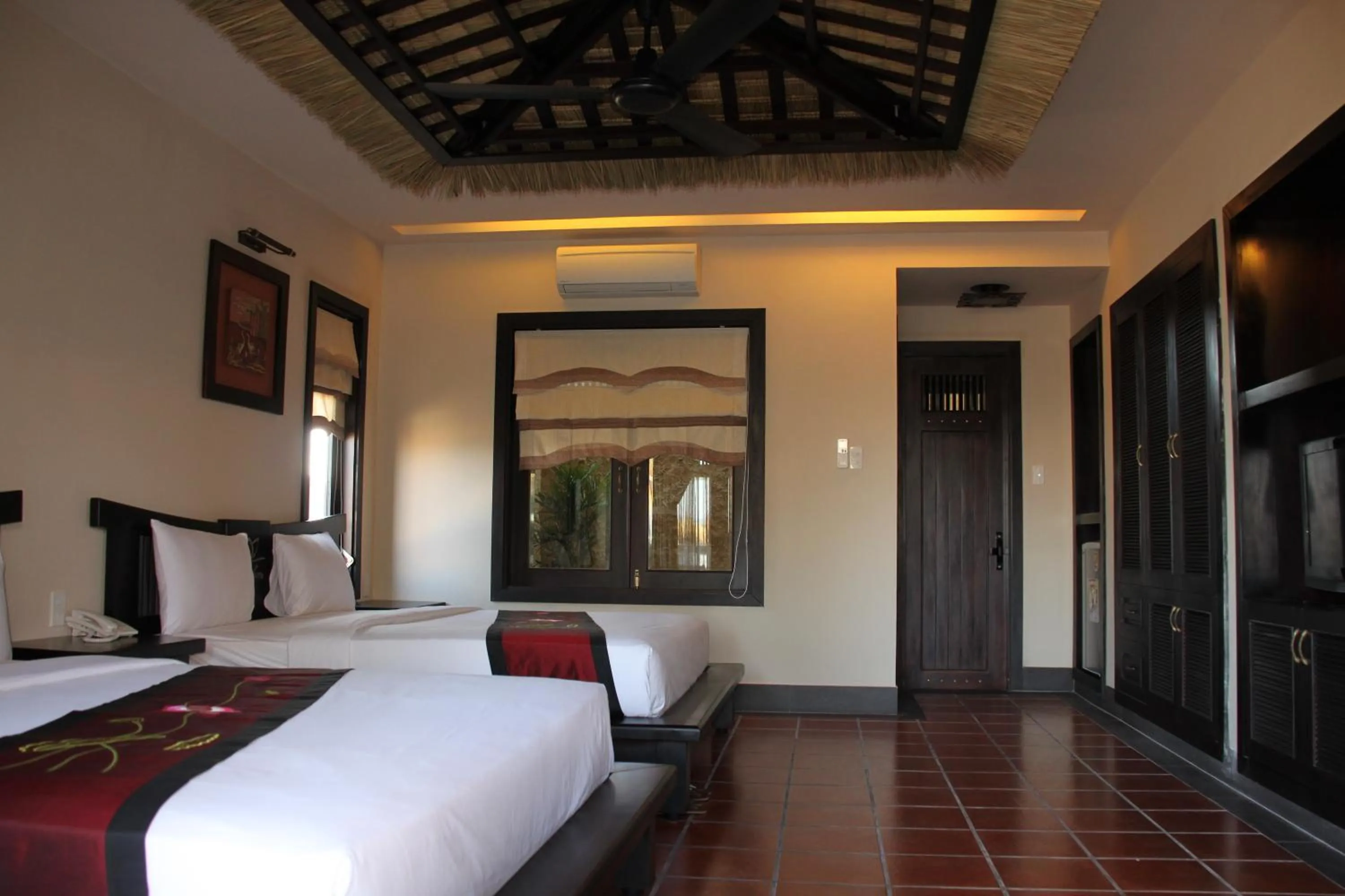 Bedroom, Bed in Lotus Village Resort