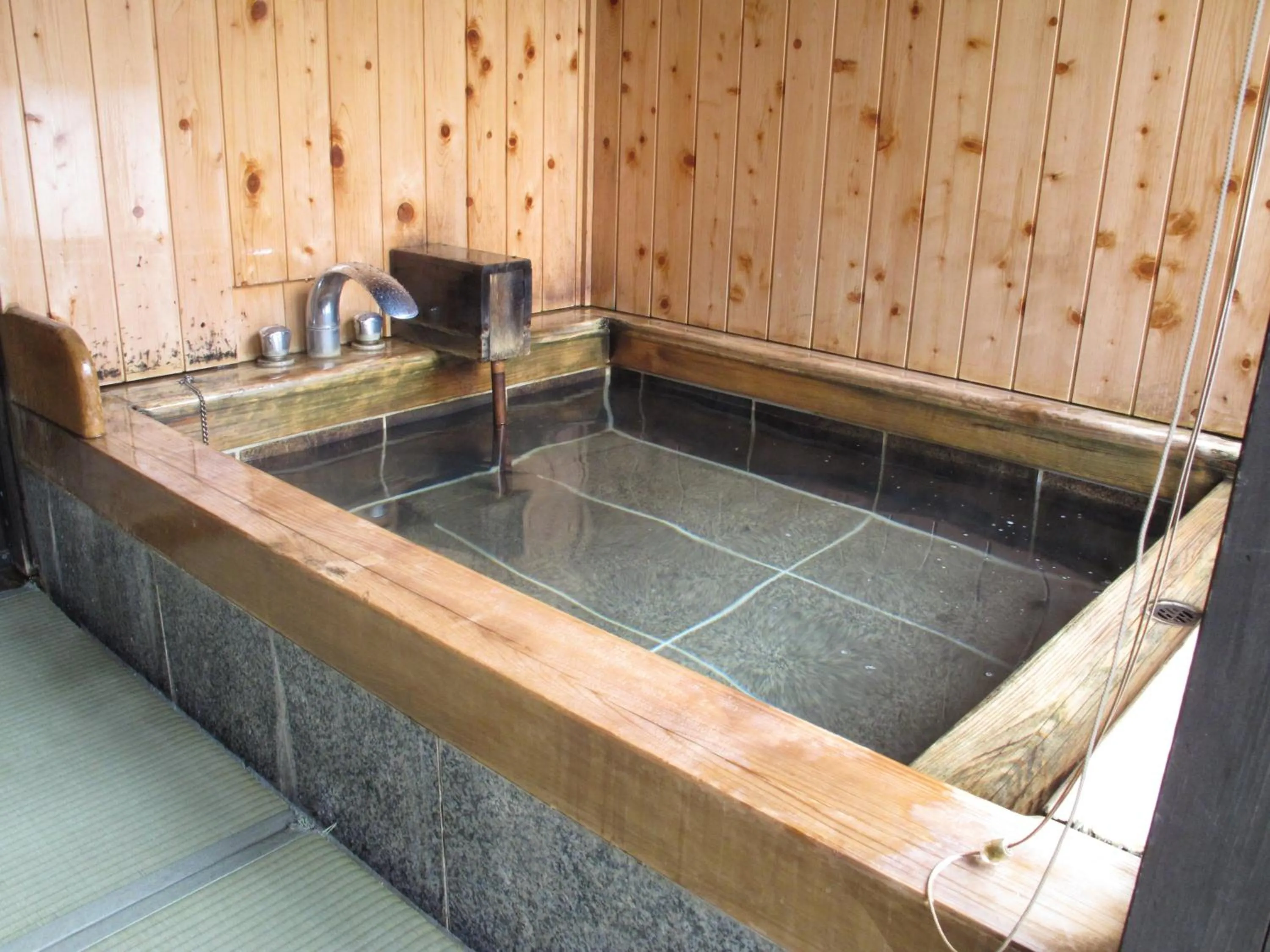 Hot Spring Bath in Okada Ryokan Warakutei