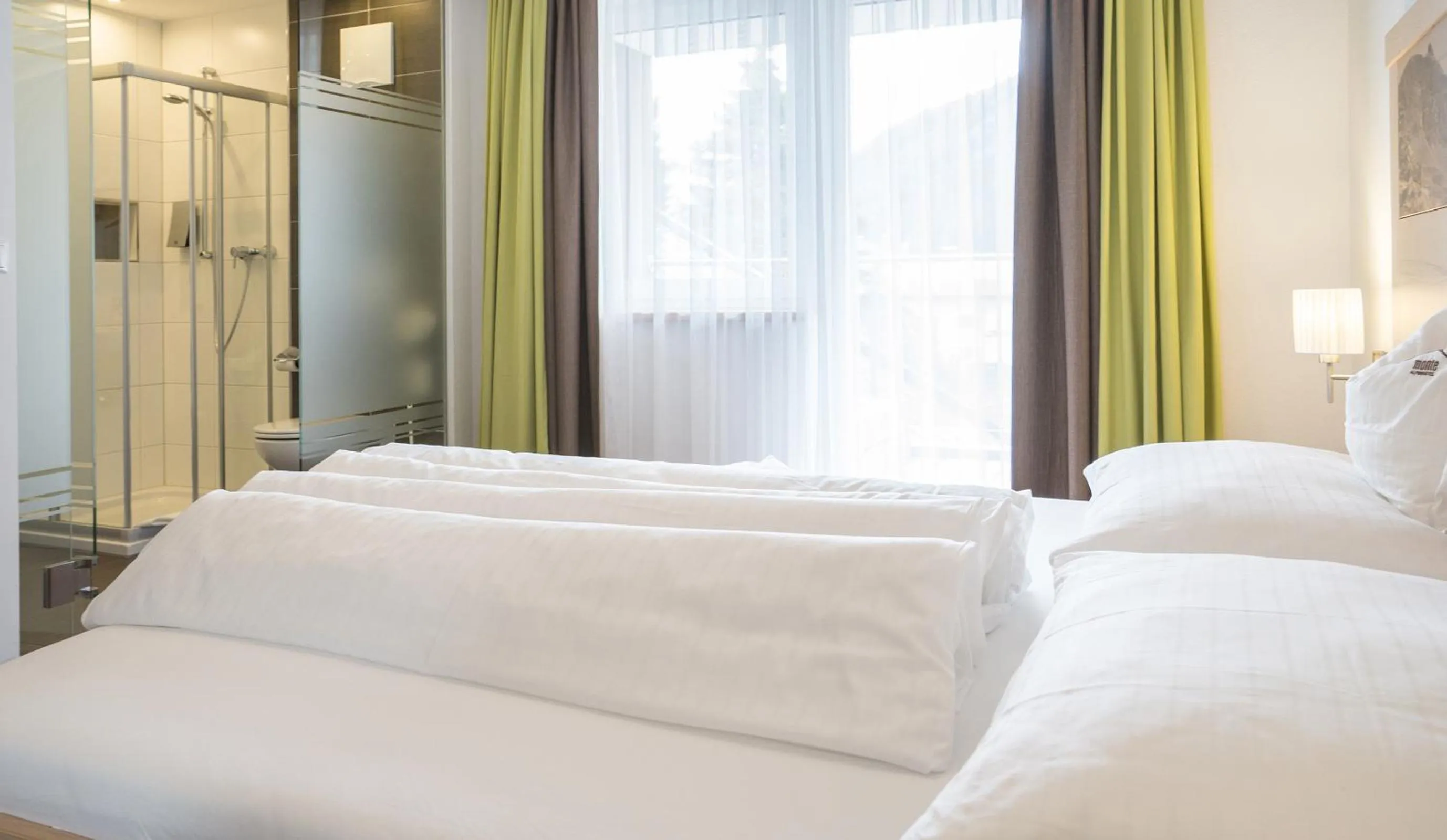 Bed in Alpinhotel Monte Superior - Silvretta Card Premium Betrieb