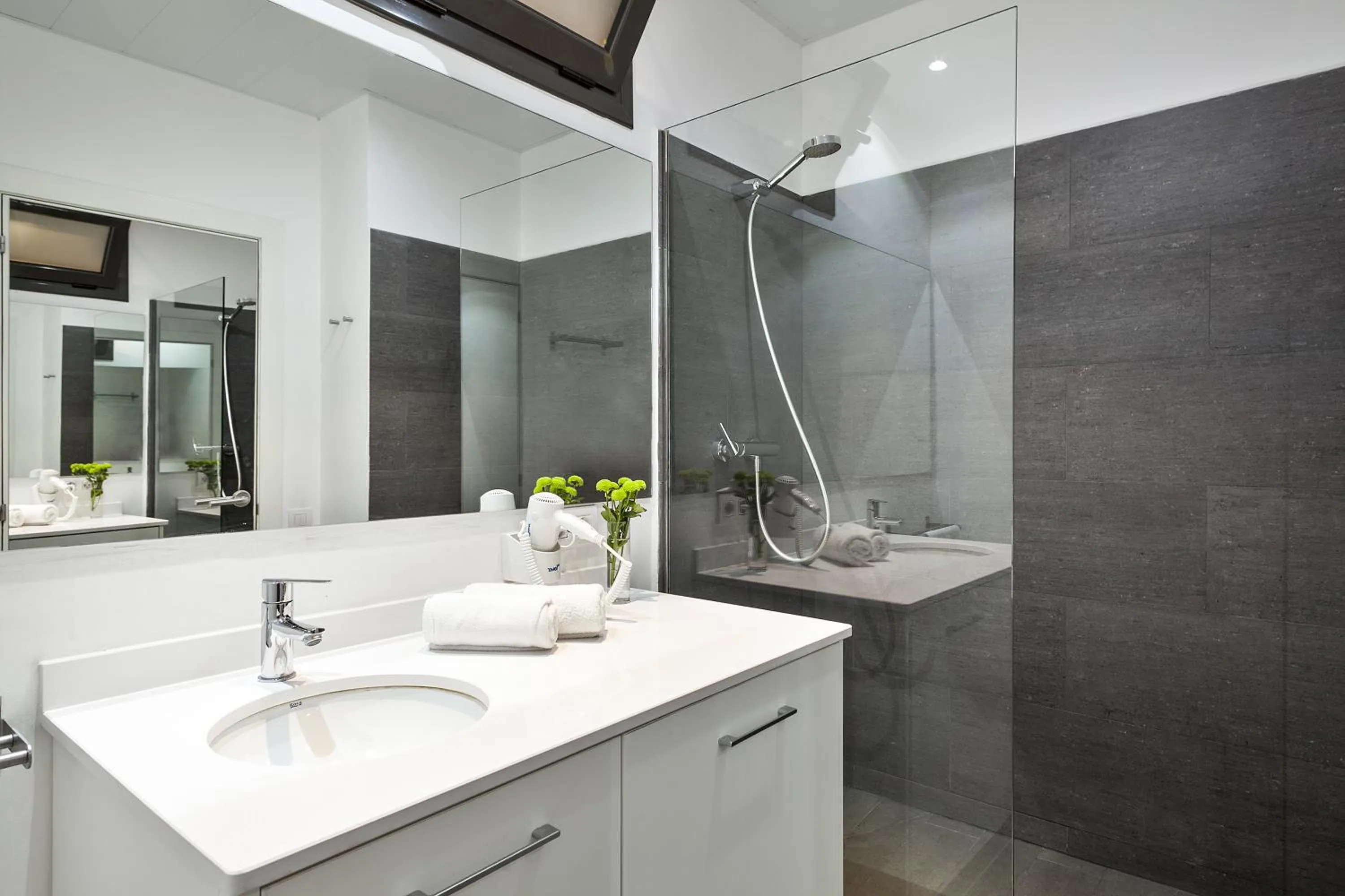 Shower in Fira Apartments by gaiarooms