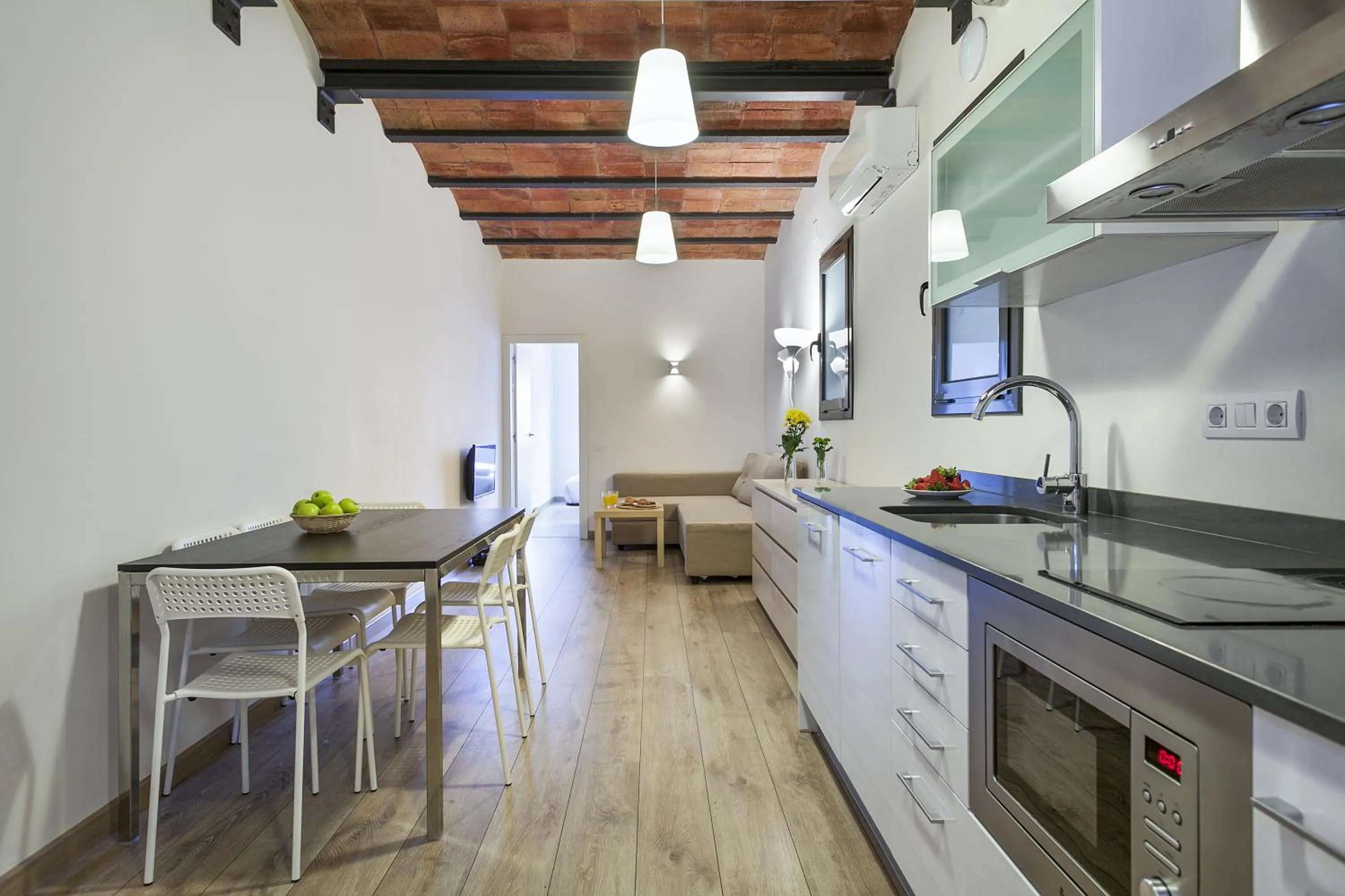 Kitchen or kitchenette in Fira Apartments by gaiarooms