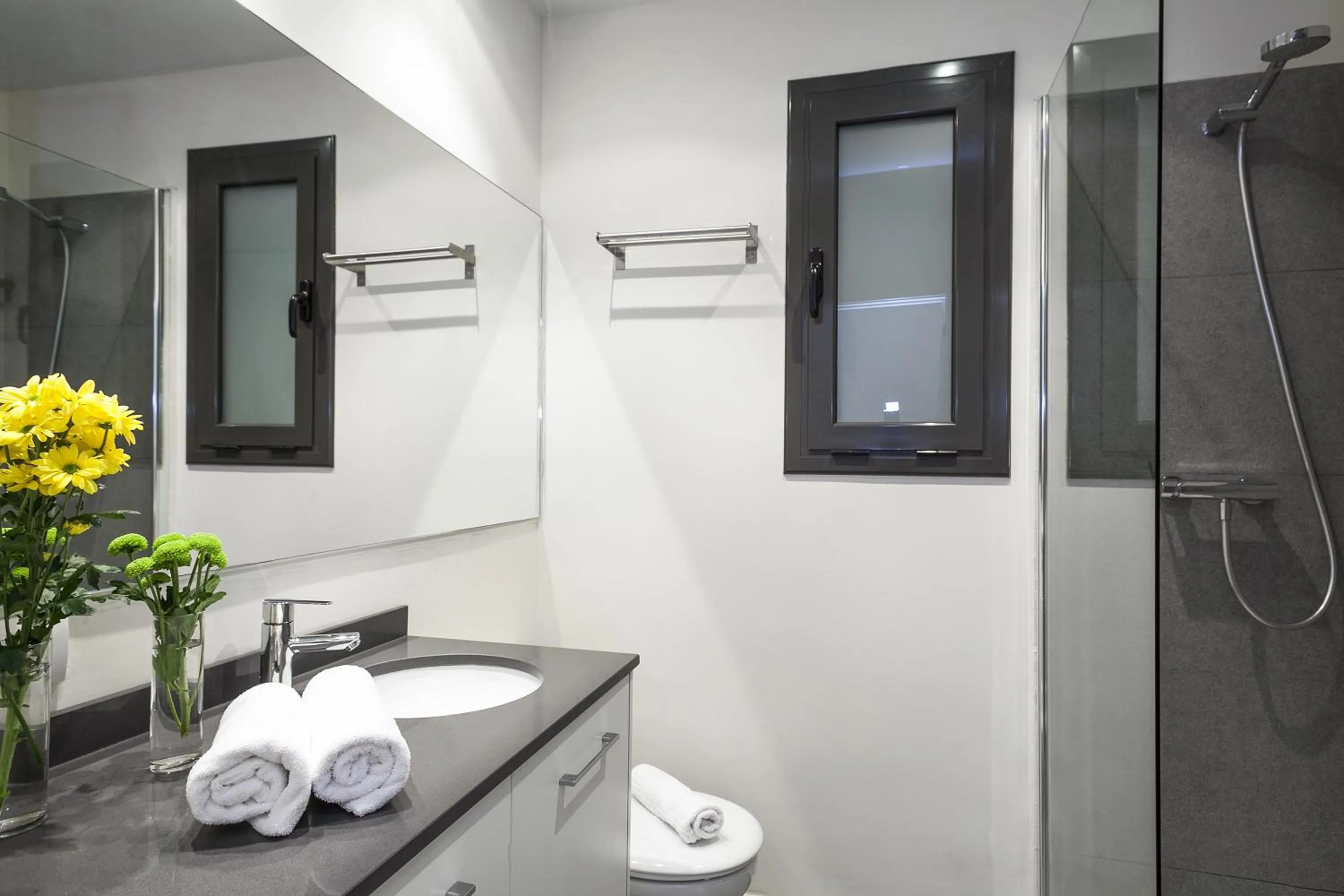 Shower in Fira Apartments by gaiarooms