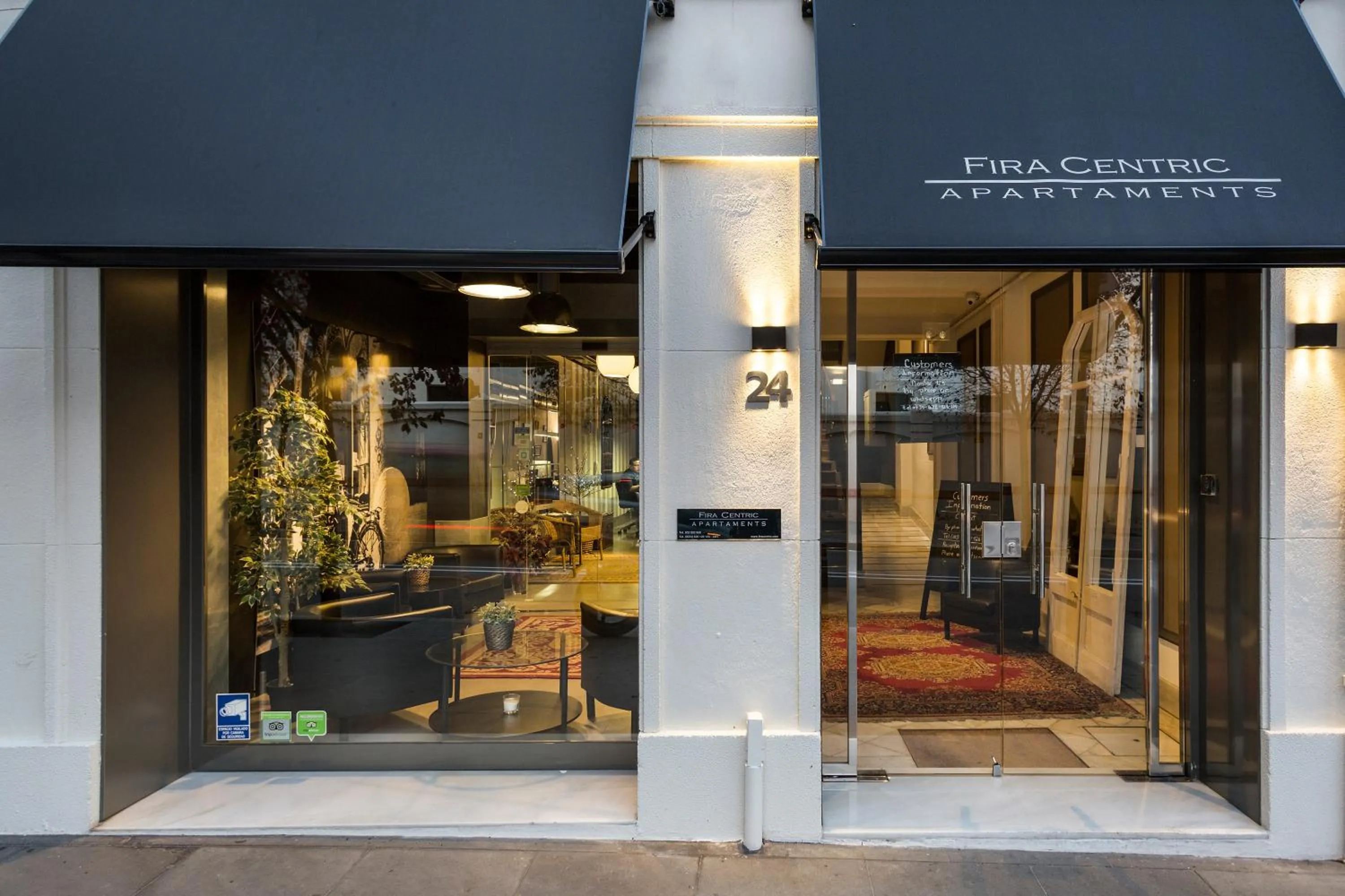 Facade/entrance in Fira Apartments by gaiarooms