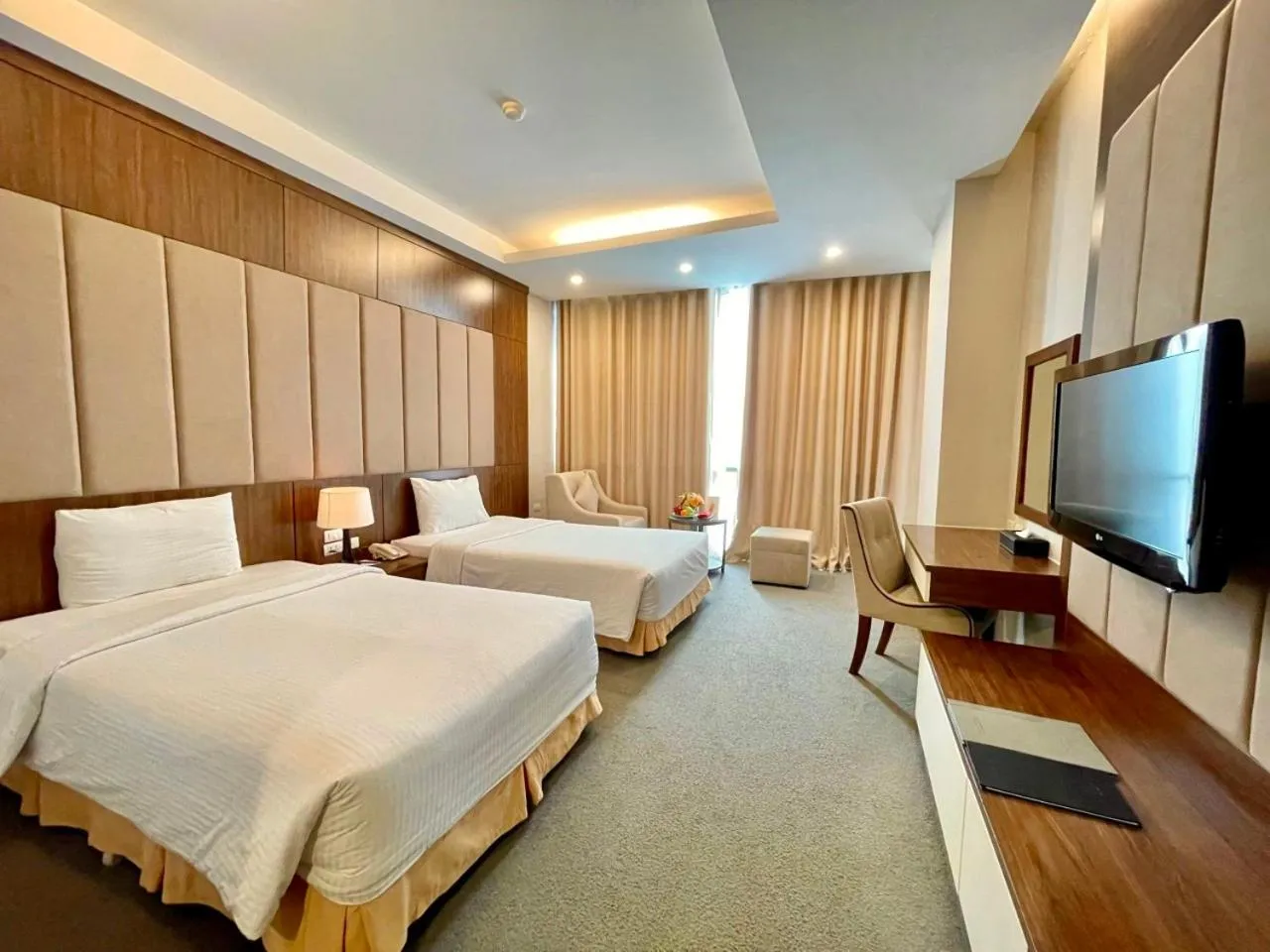 Communal lounge/ TV room, Bed in Muong Thanh Grand Xa La Hotel