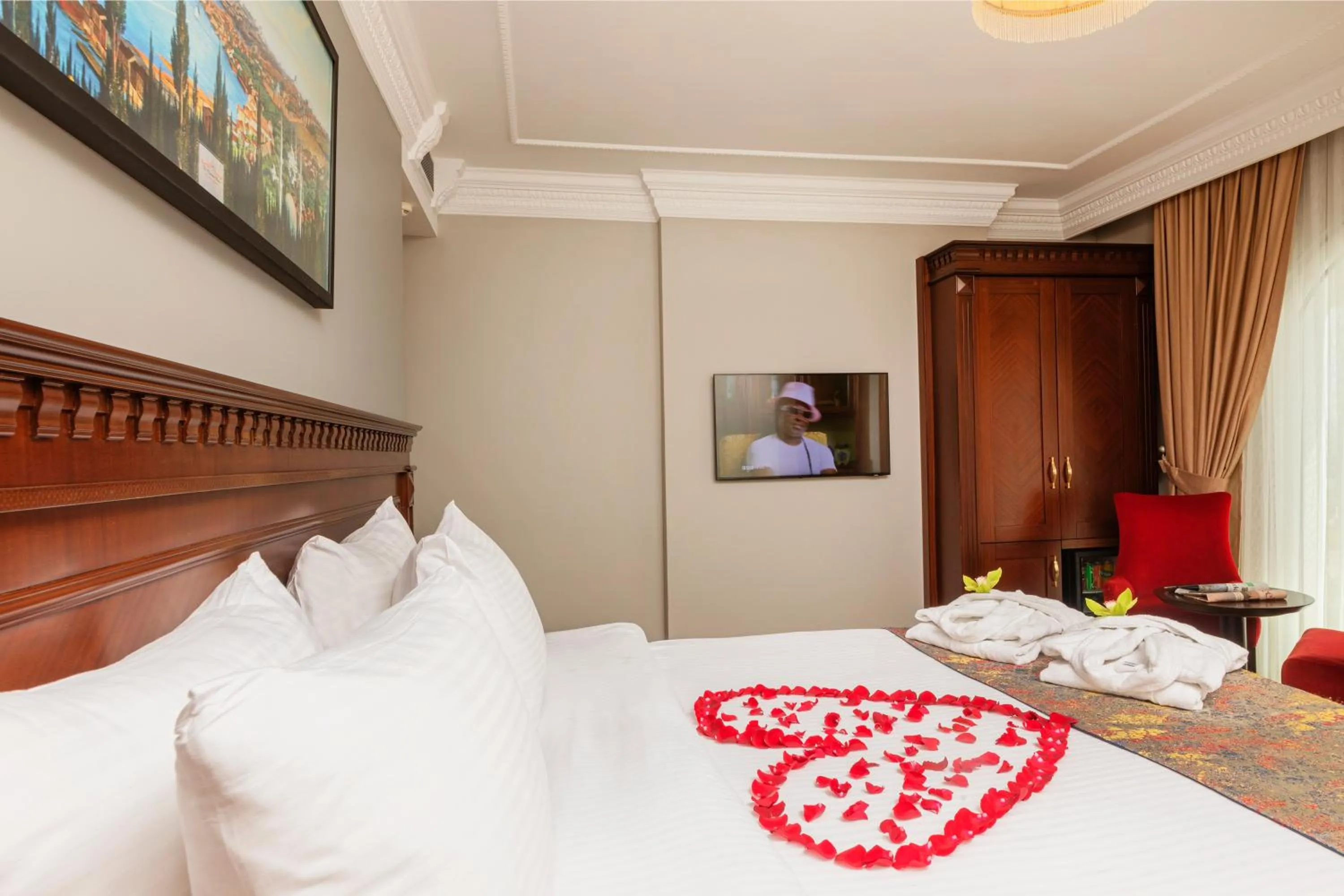 Bed in The Magnaura Palace Hotel