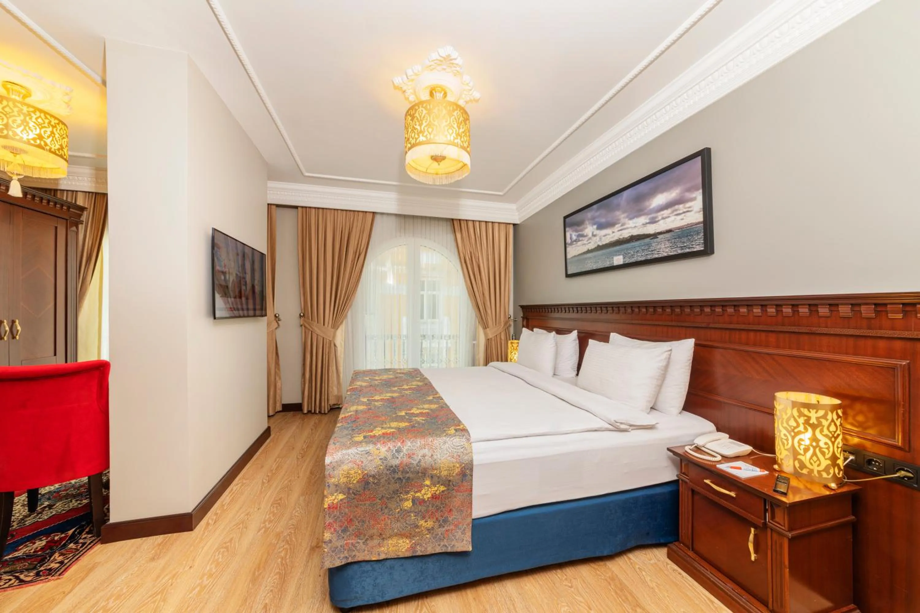 Bed in The Magnaura Palace Hotel