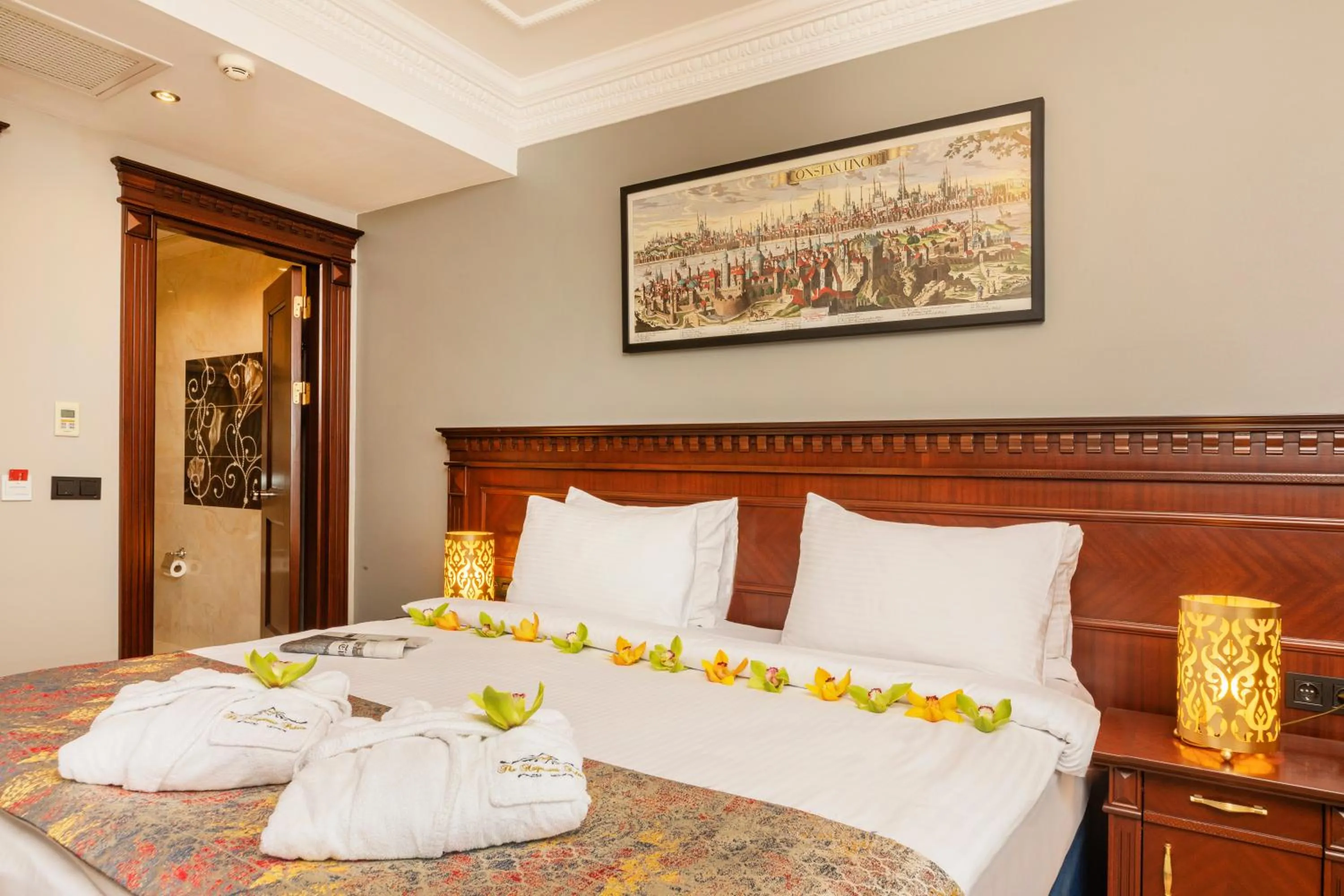 Bed in The Magnaura Palace Hotel