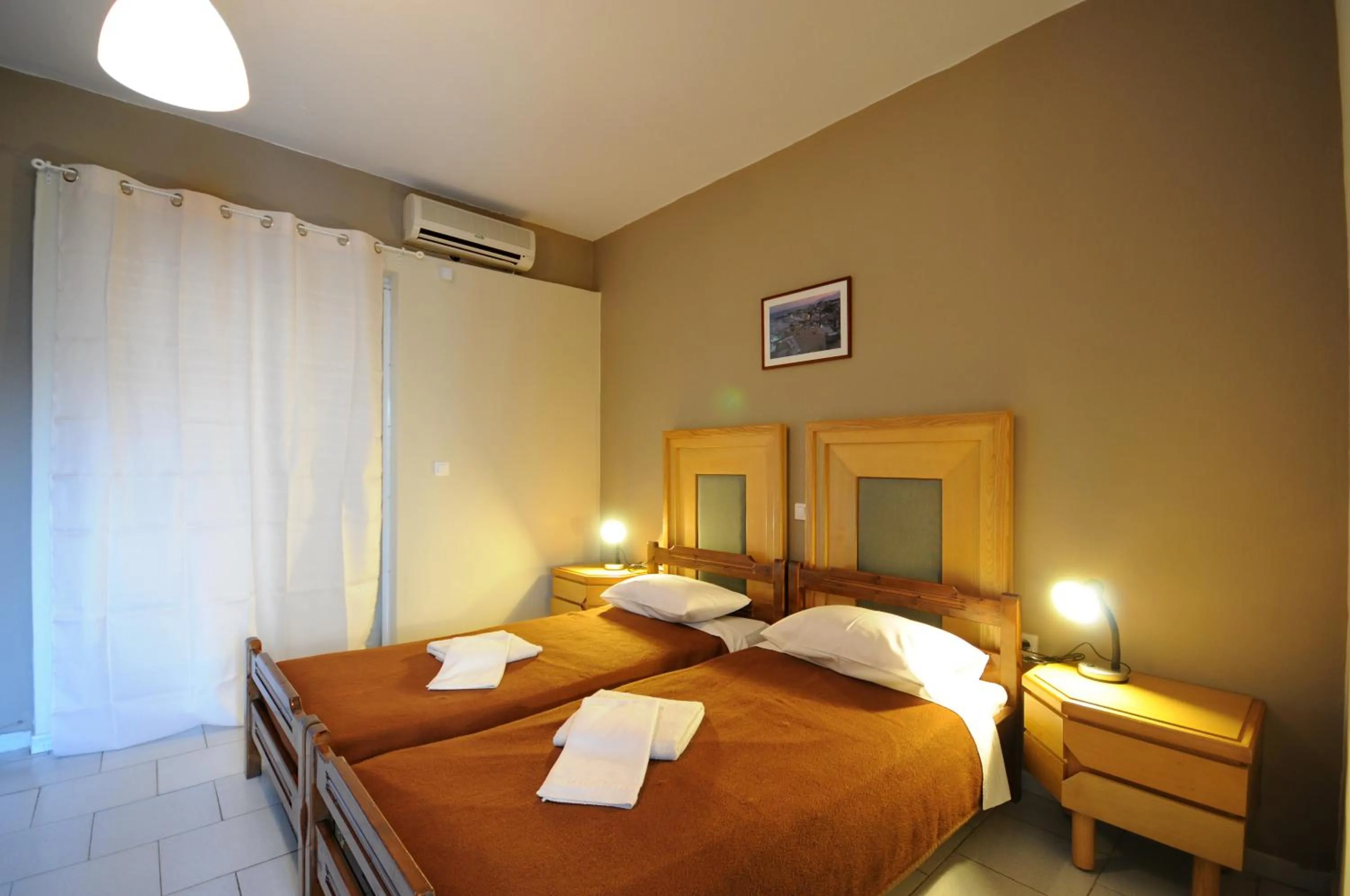 Photo of the whole room, Bed in Manias Apartments