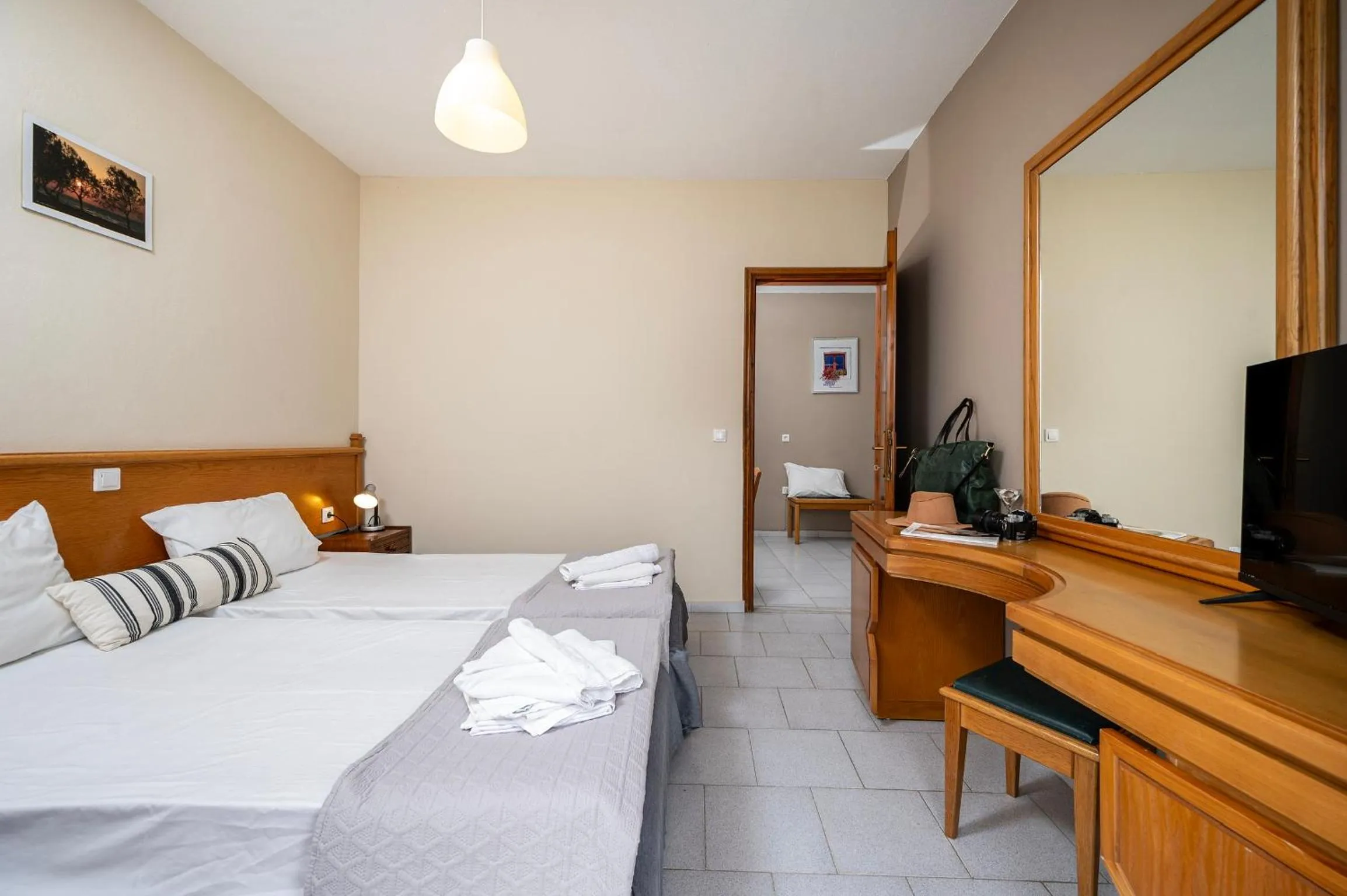 Bed in Manias Apartments