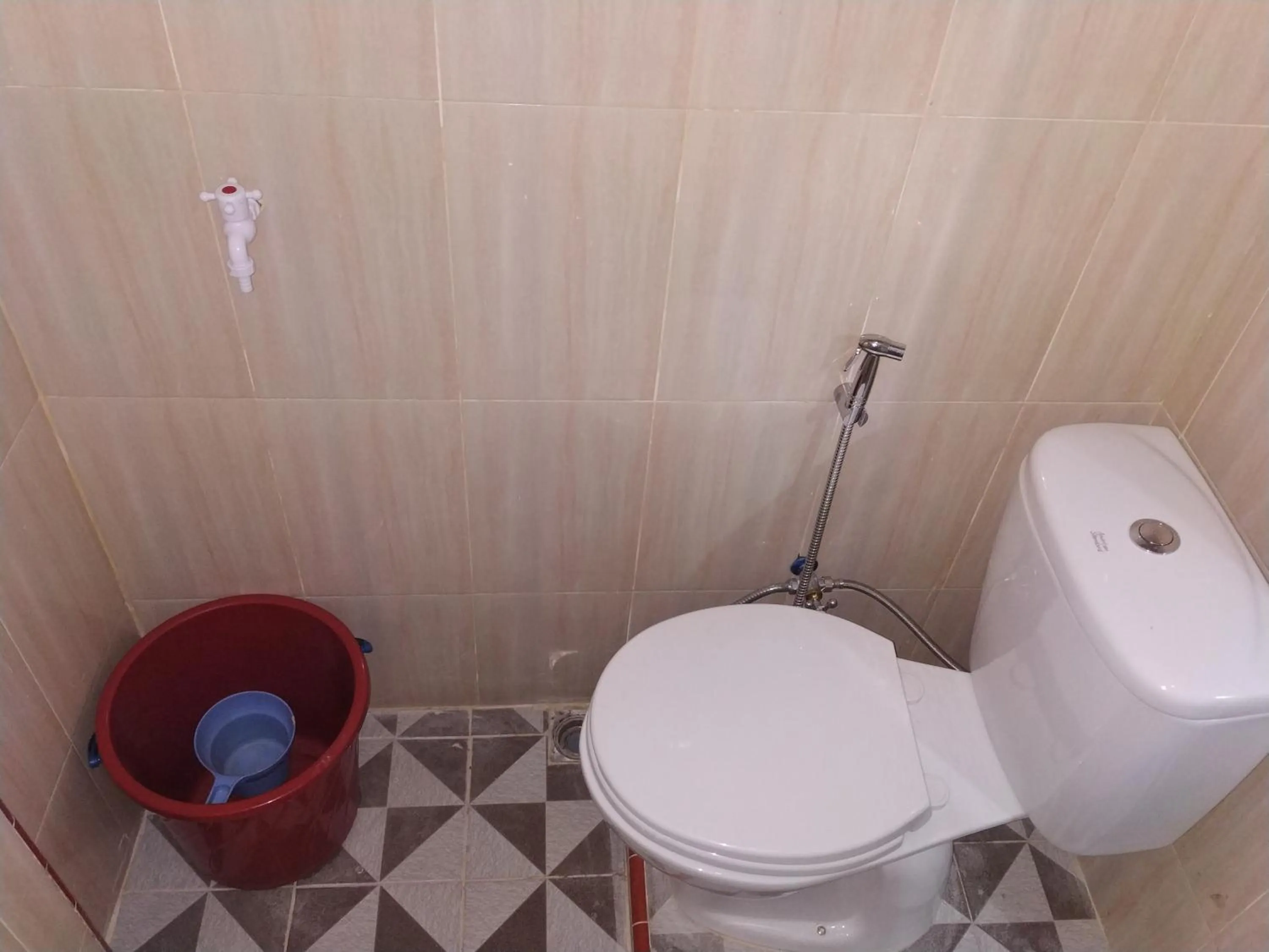 Bed in Penginapan Intan Bandara