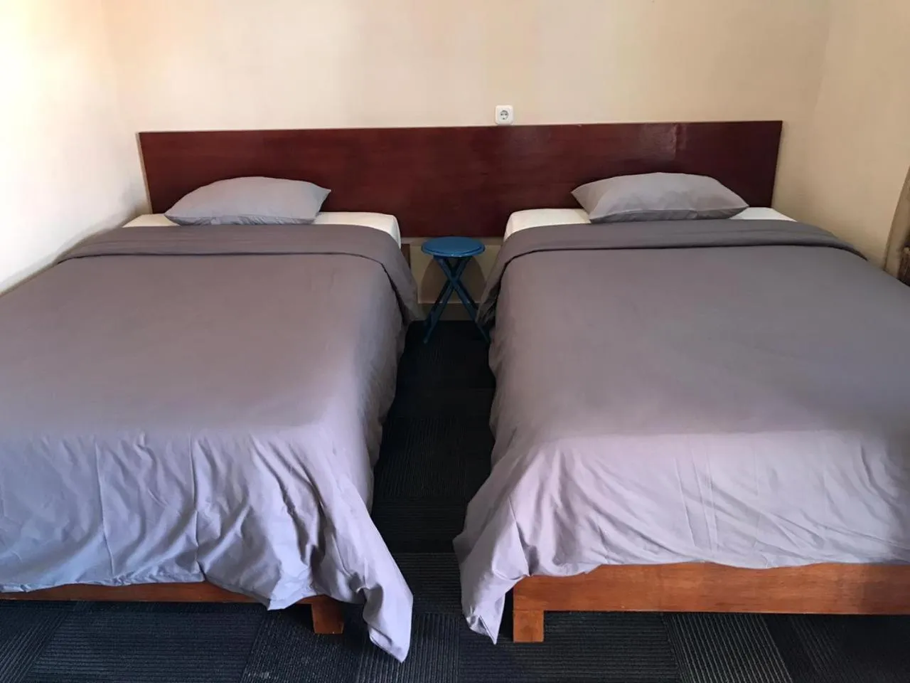 Bed in Penginapan Intan Bandara