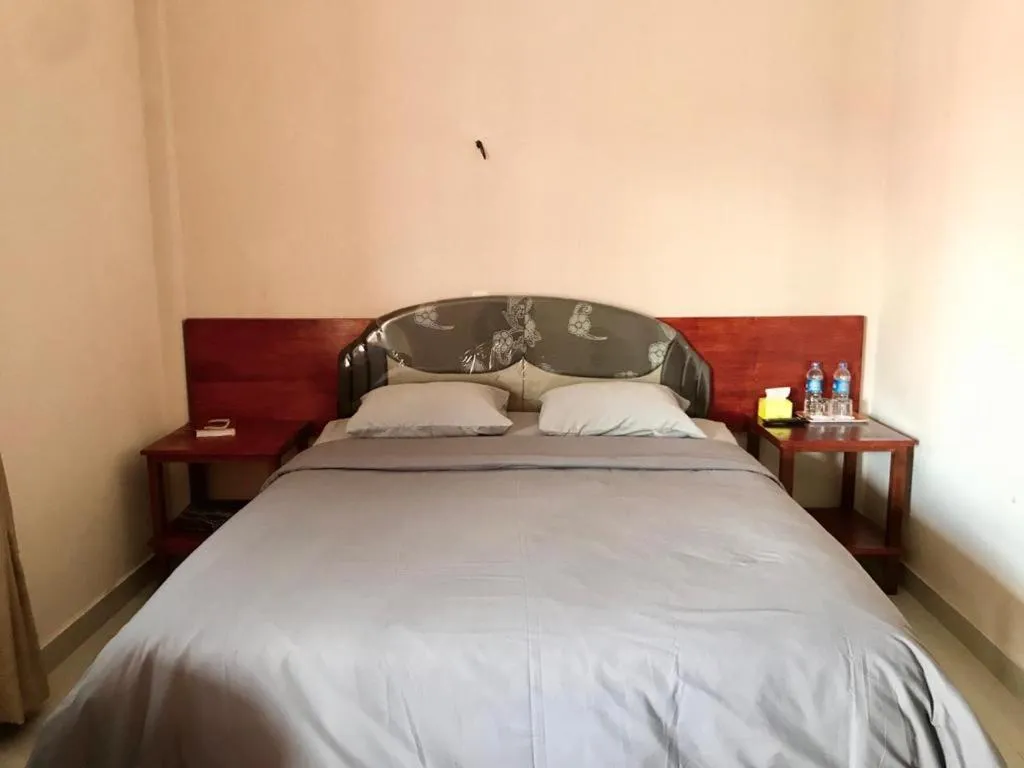 Bed in Penginapan Intan Bandara