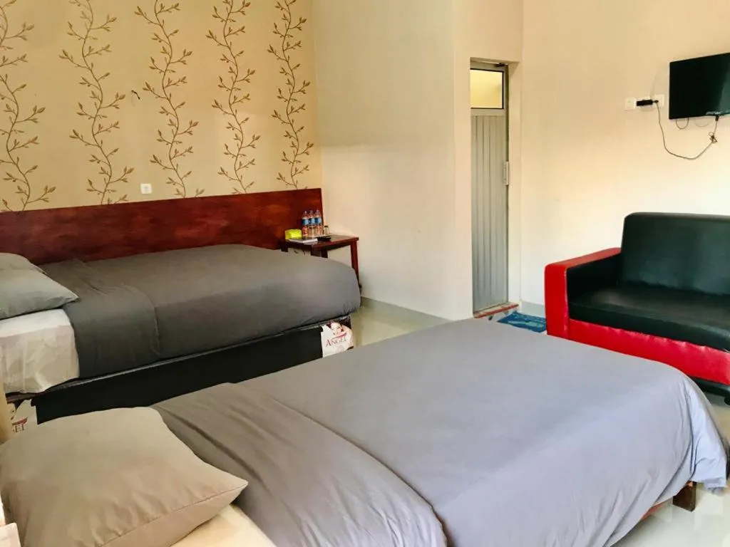 Bed in Penginapan Intan Bandara