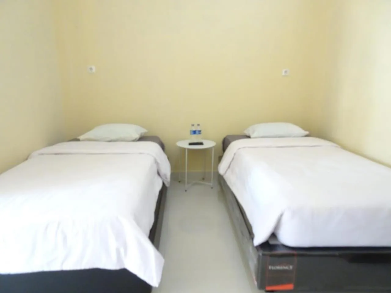 Bed in Penginapan Intan Bandara