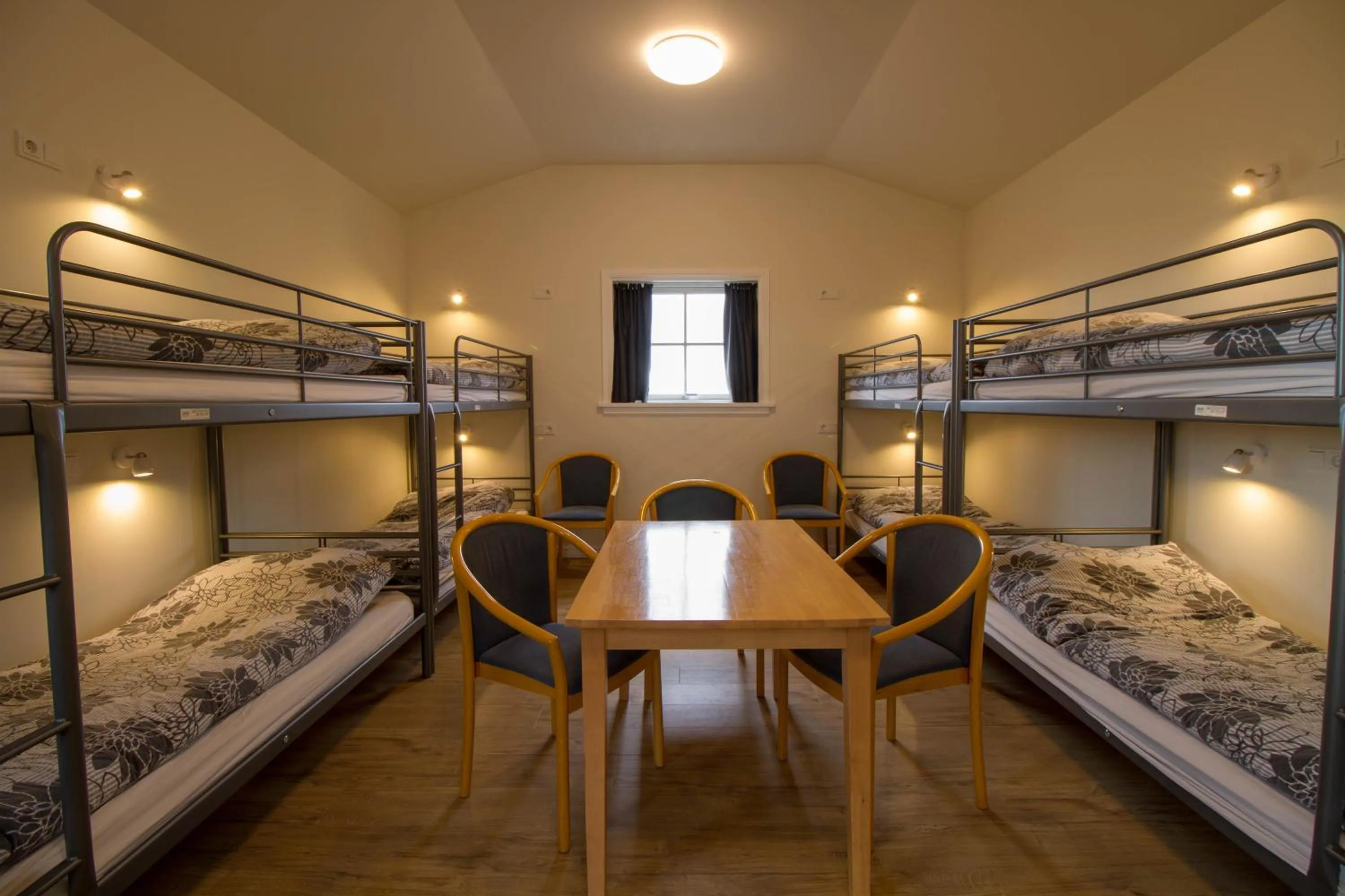 Seating area, Bed in Hotel Hjardarbol