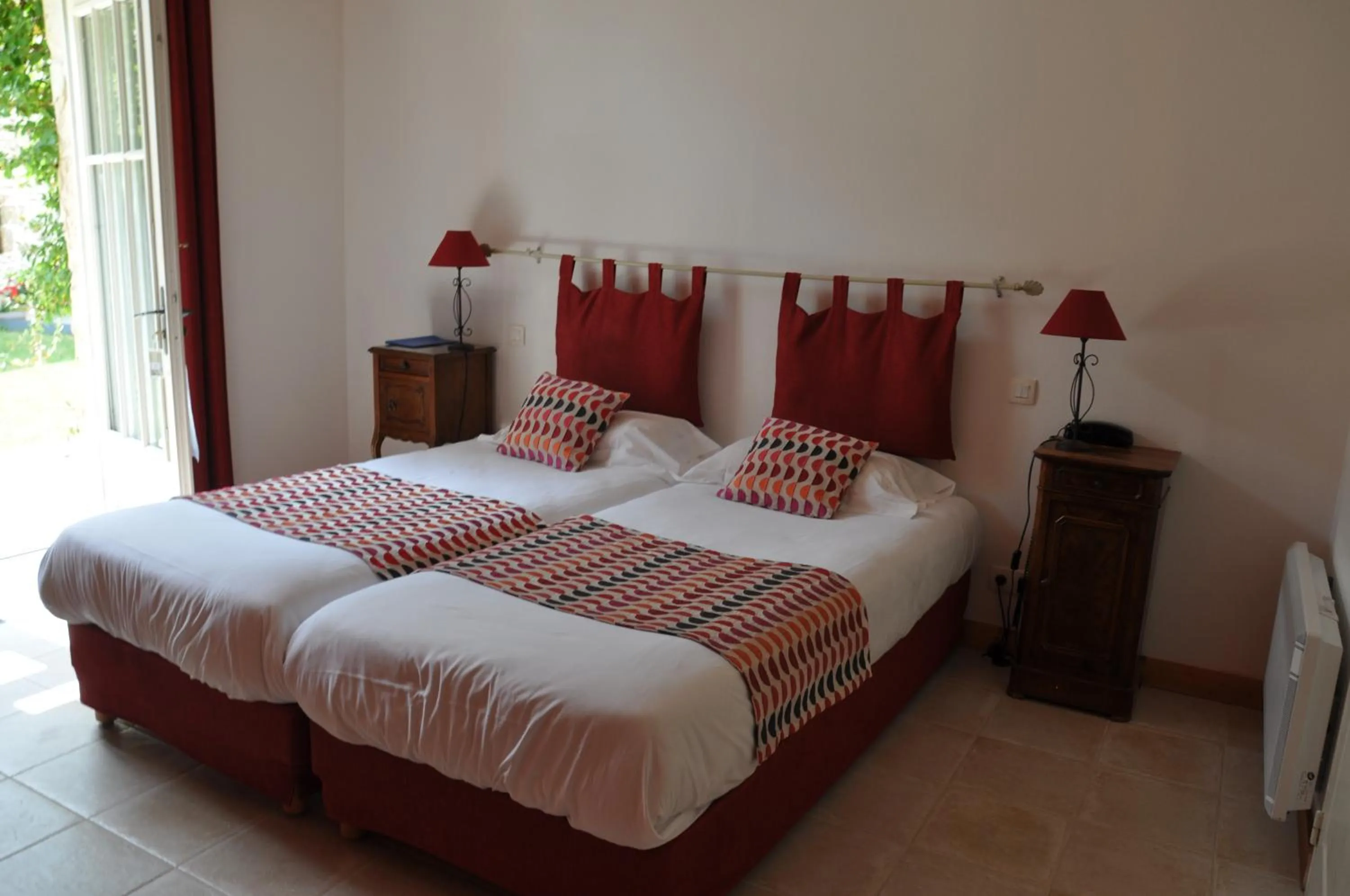 Bed in Hôtel du Donjon