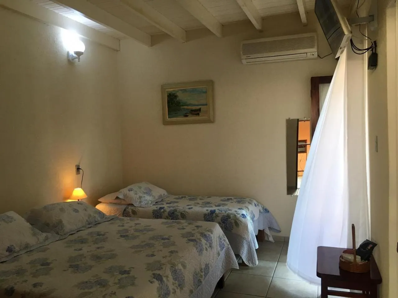 Bed in Pousada Irmãos do Mar