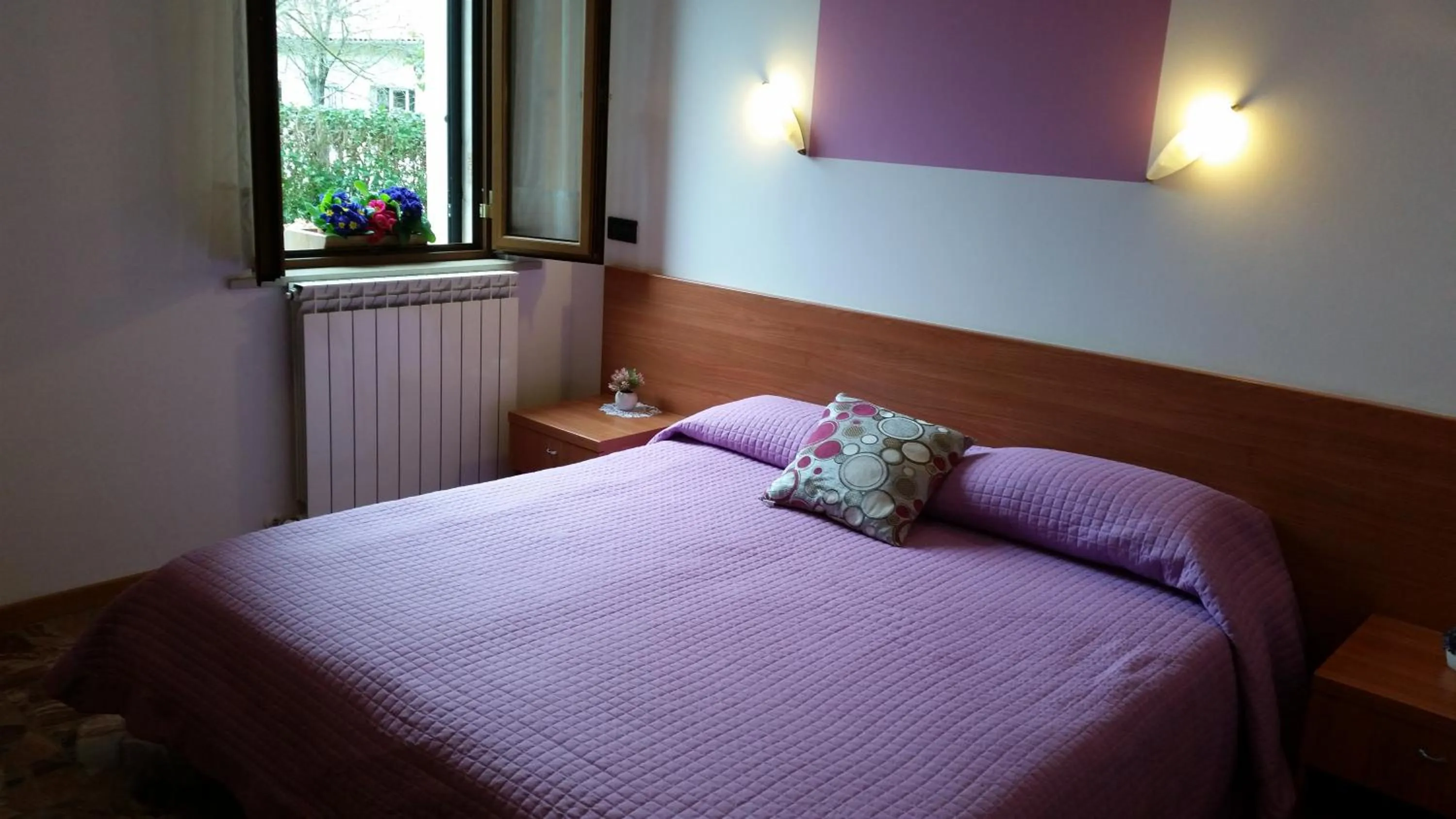 Bed in Albergo Vecchio Forno