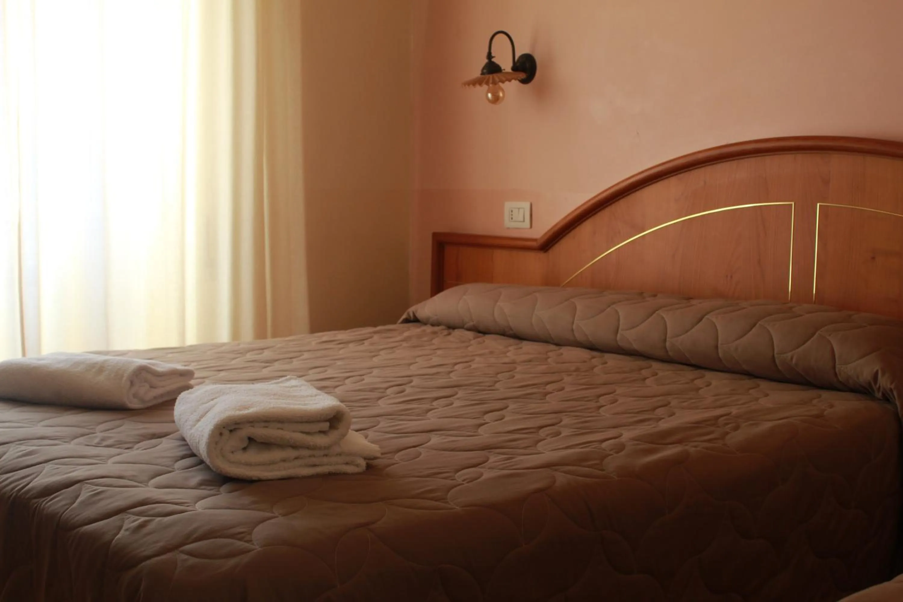 Bed in Hotel Ristorante Benigni