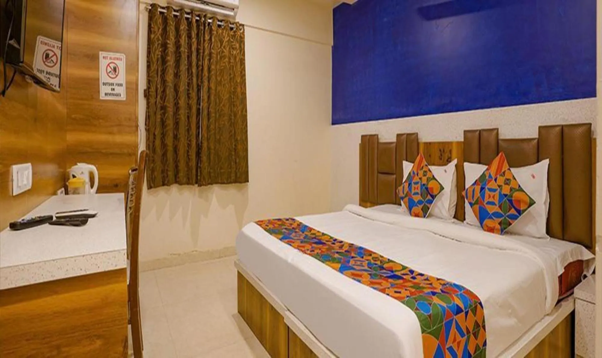 Bed in FabHotel Veera Residency - Nr Mumbai International Airport
