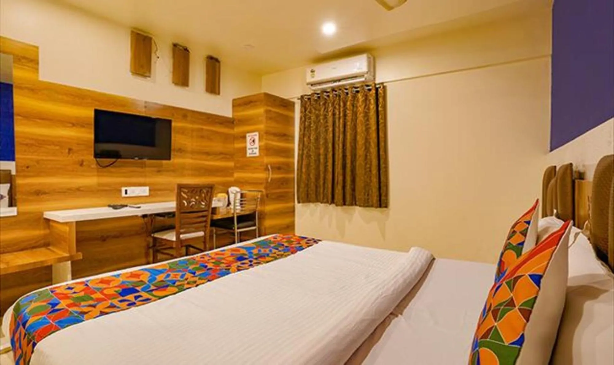 Bed in FabHotel Veera Residency - Nr Mumbai International Airport