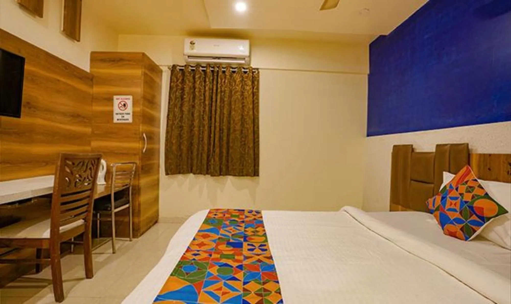 Bed in FabHotel Veera Residency - Nr Mumbai International Airport