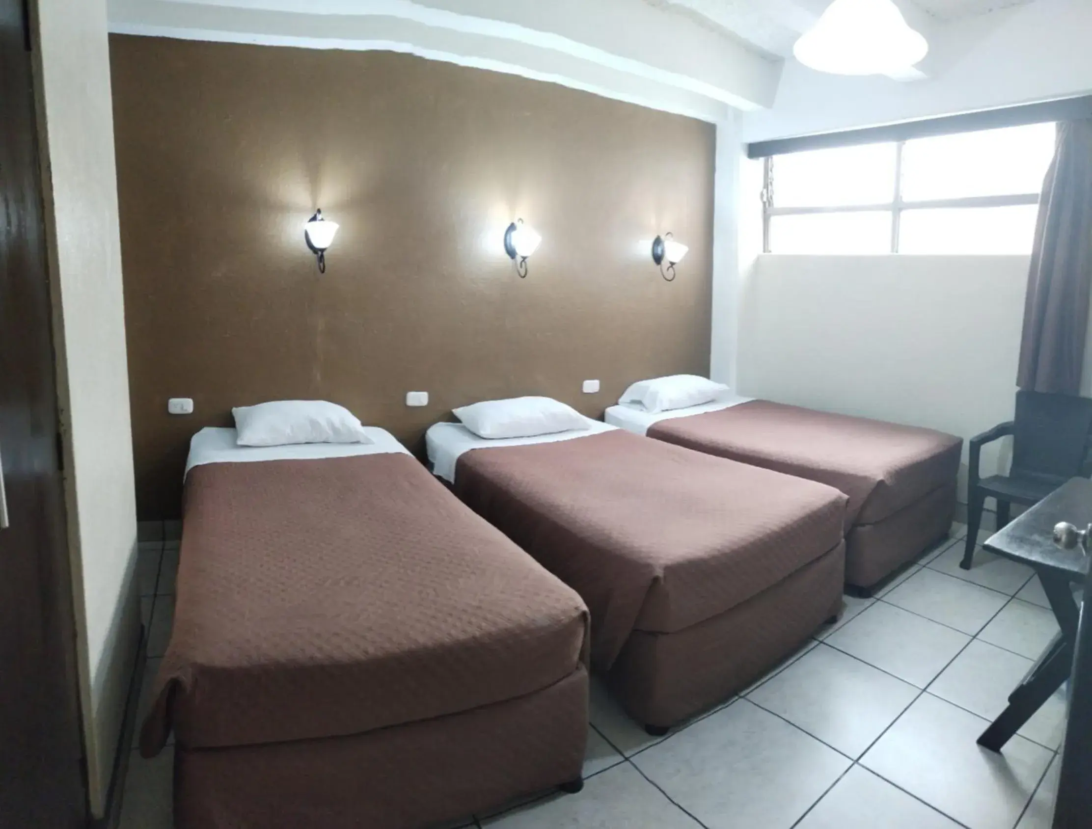 Triple Room in Hotel Capri Triple Room in Hotel Capri