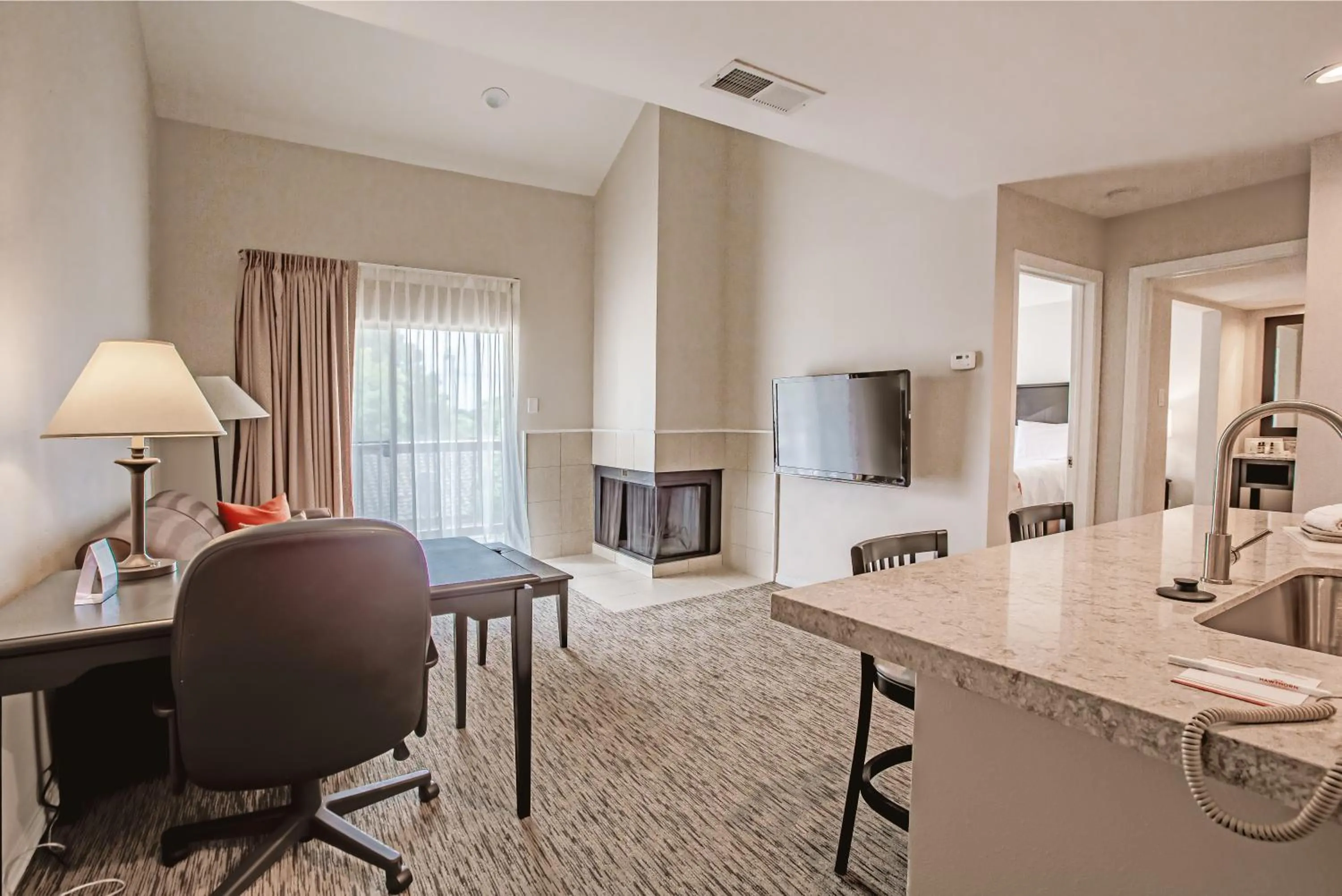Living room in Craigshire Suites - Arlington