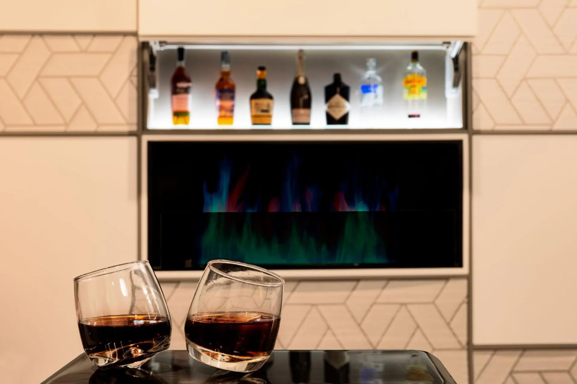 Communal lounge/ TV room in Amadomus Luxury Suites