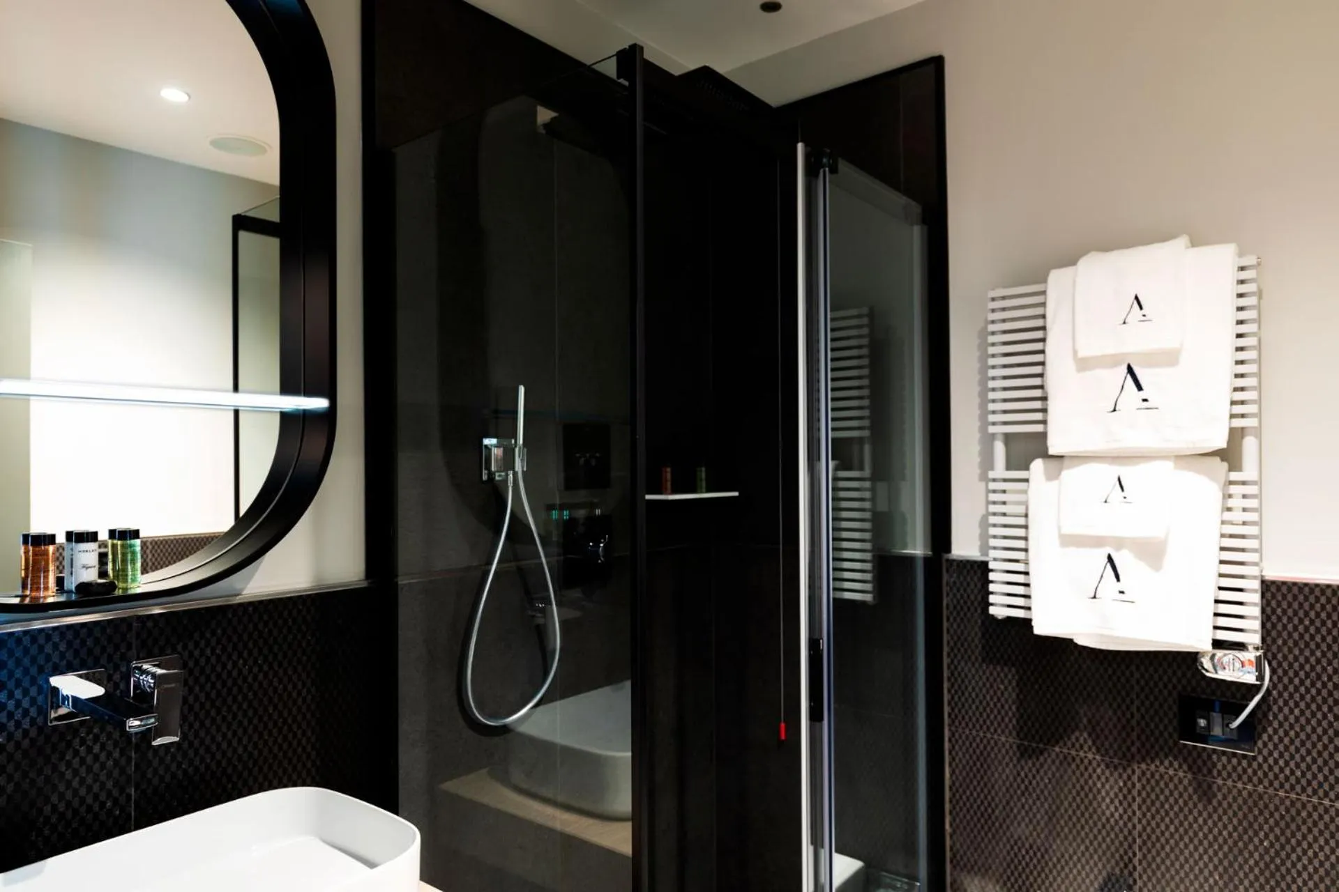 Shower in Amadomus Luxury Suites