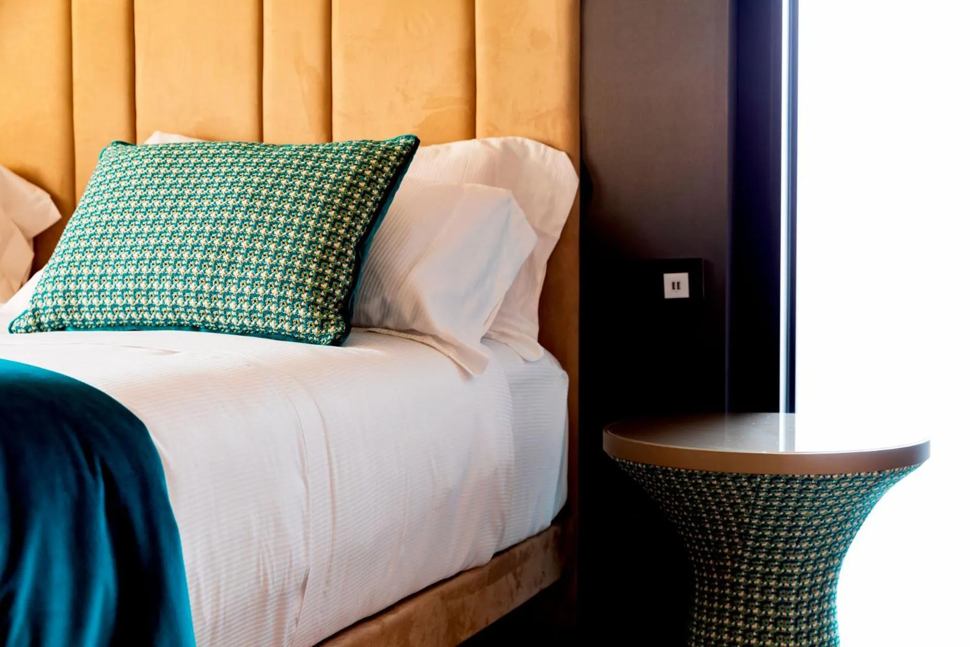 Bed in Amadomus Luxury Suites