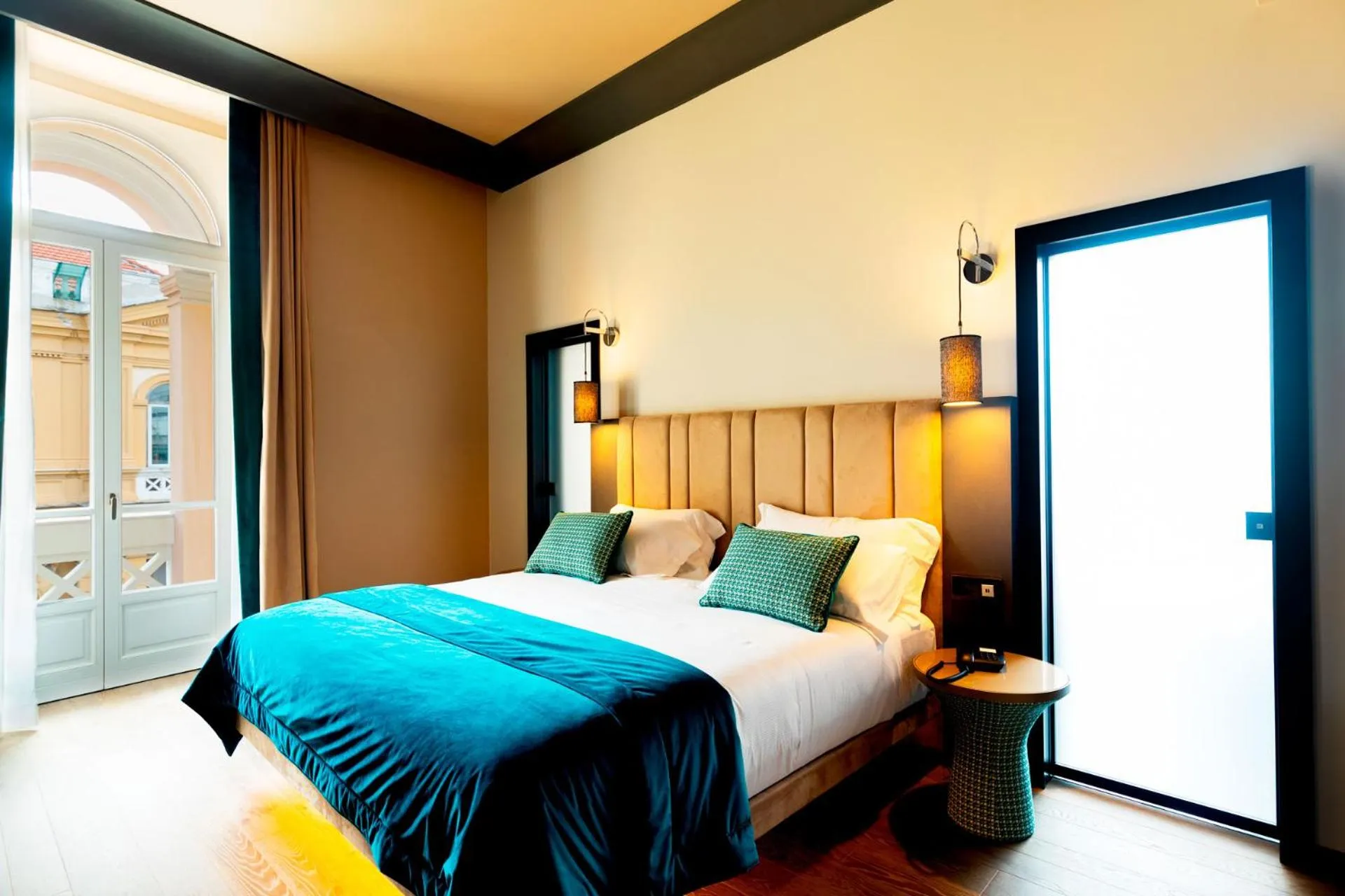 Bed in Amadomus Luxury Suites