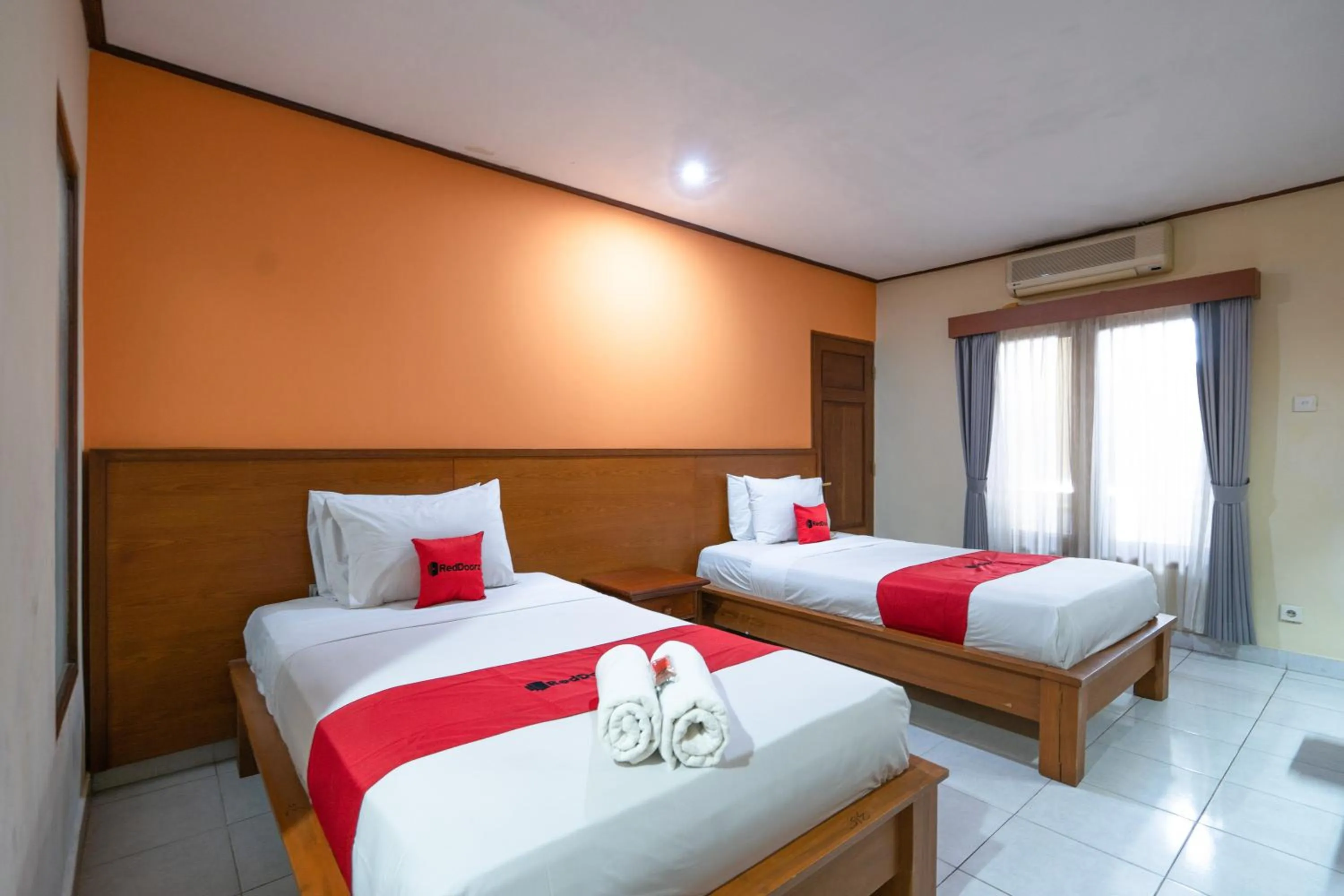 Bedroom in RedDoorz Plus at Mahajaya Hotel Denpasar